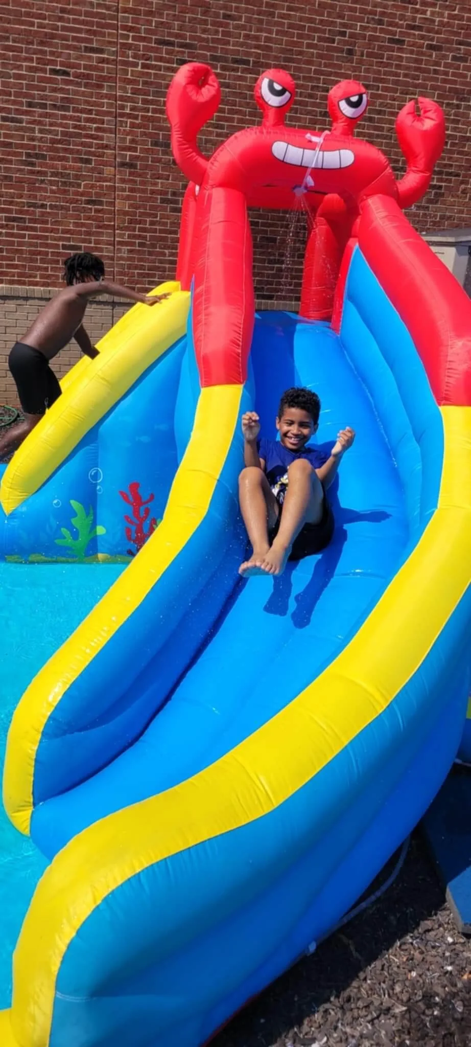 kids playing outside at a school year camp
