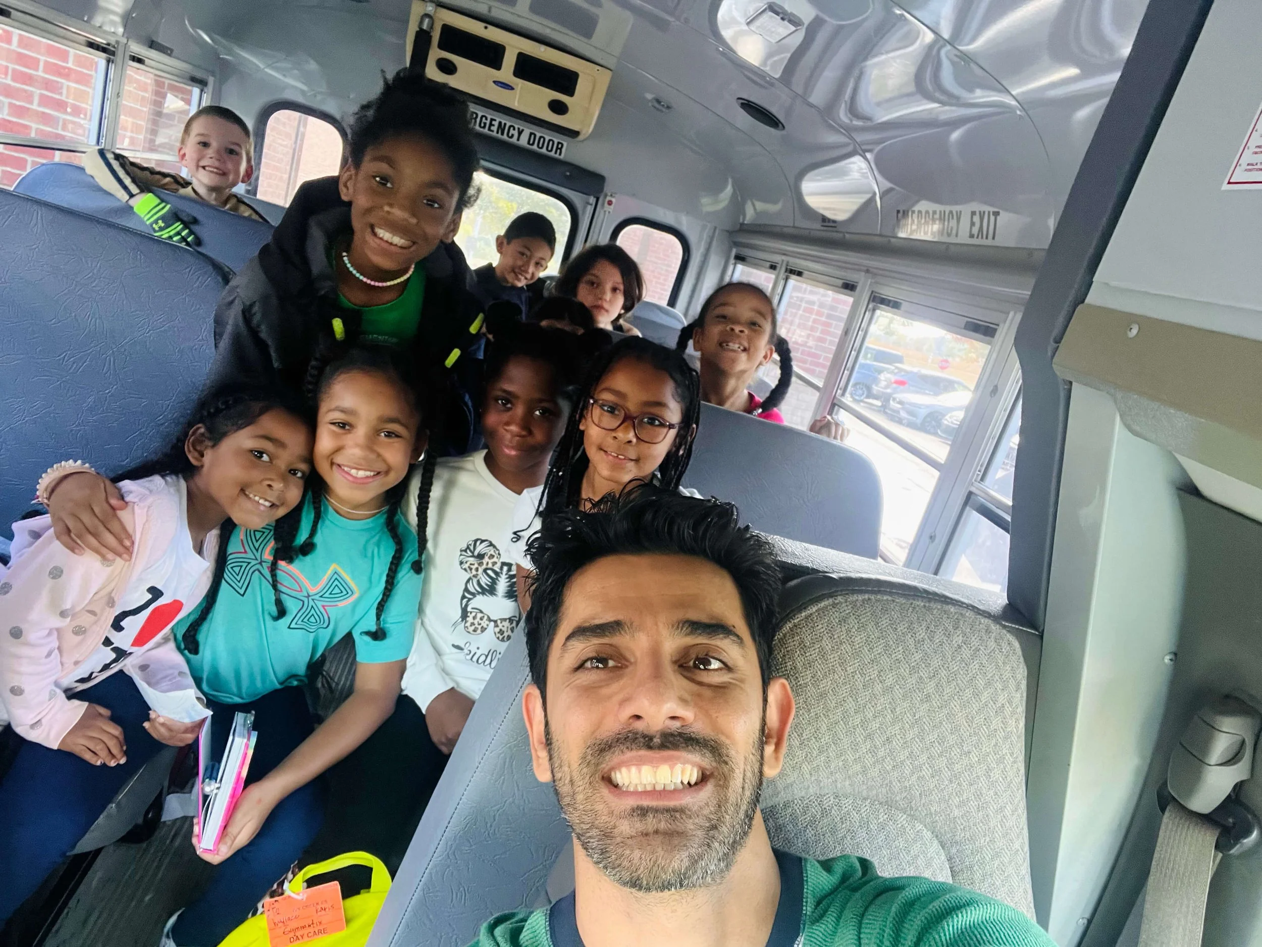 children in a bus going to an after school program