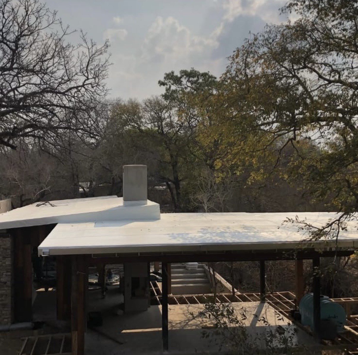 Roof pvc waterproofing system applied to lodge building by Prime Surfaces