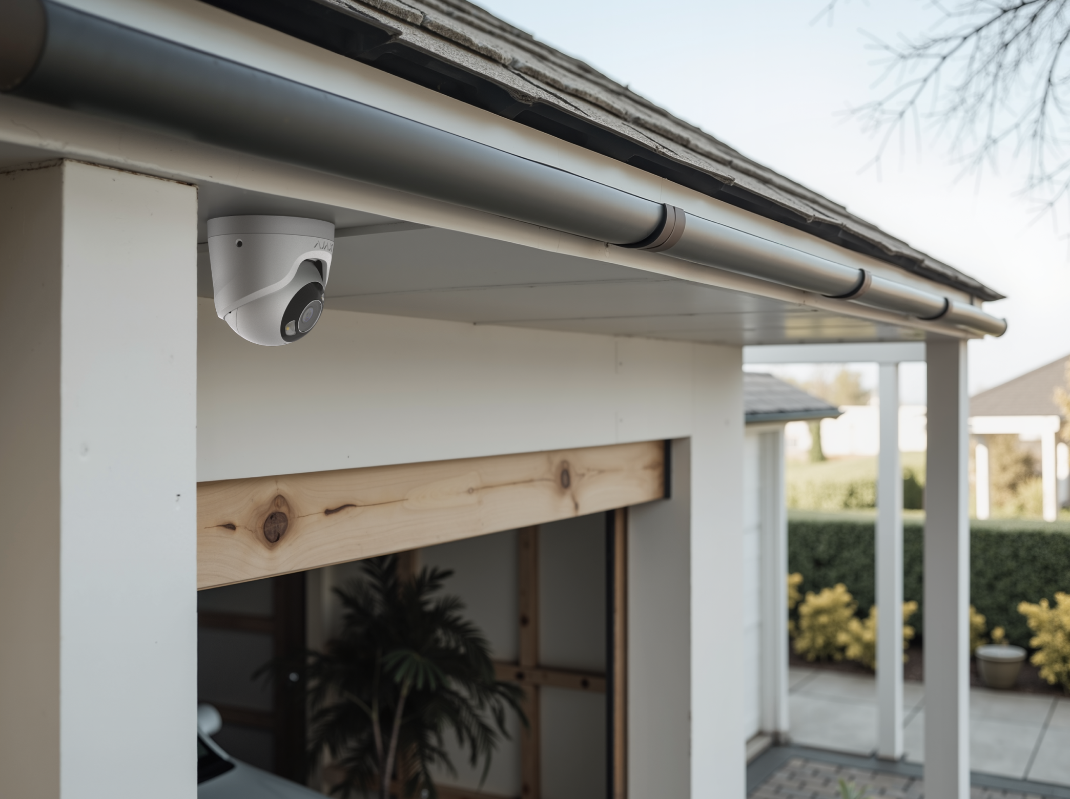 Domestic CCTV camera installed under eaves for home security by Complete Fire and Security, Hampshire and Dorset.