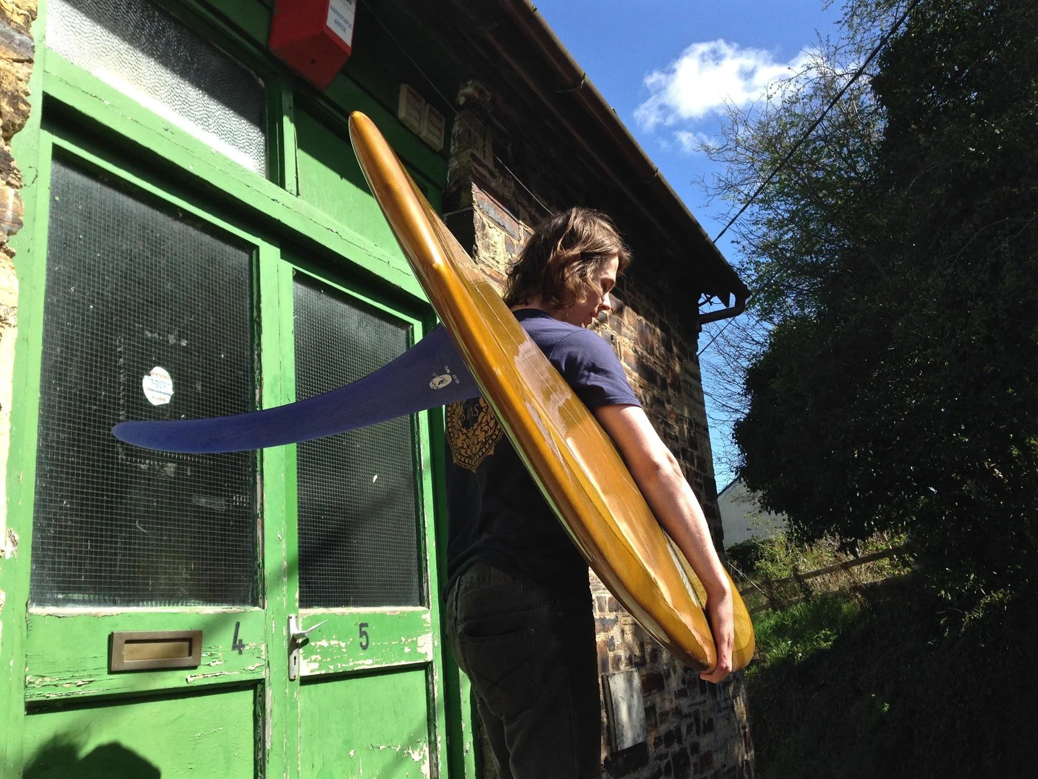 rainbow fin company longboard fin in mustard yellow resin tint longboard