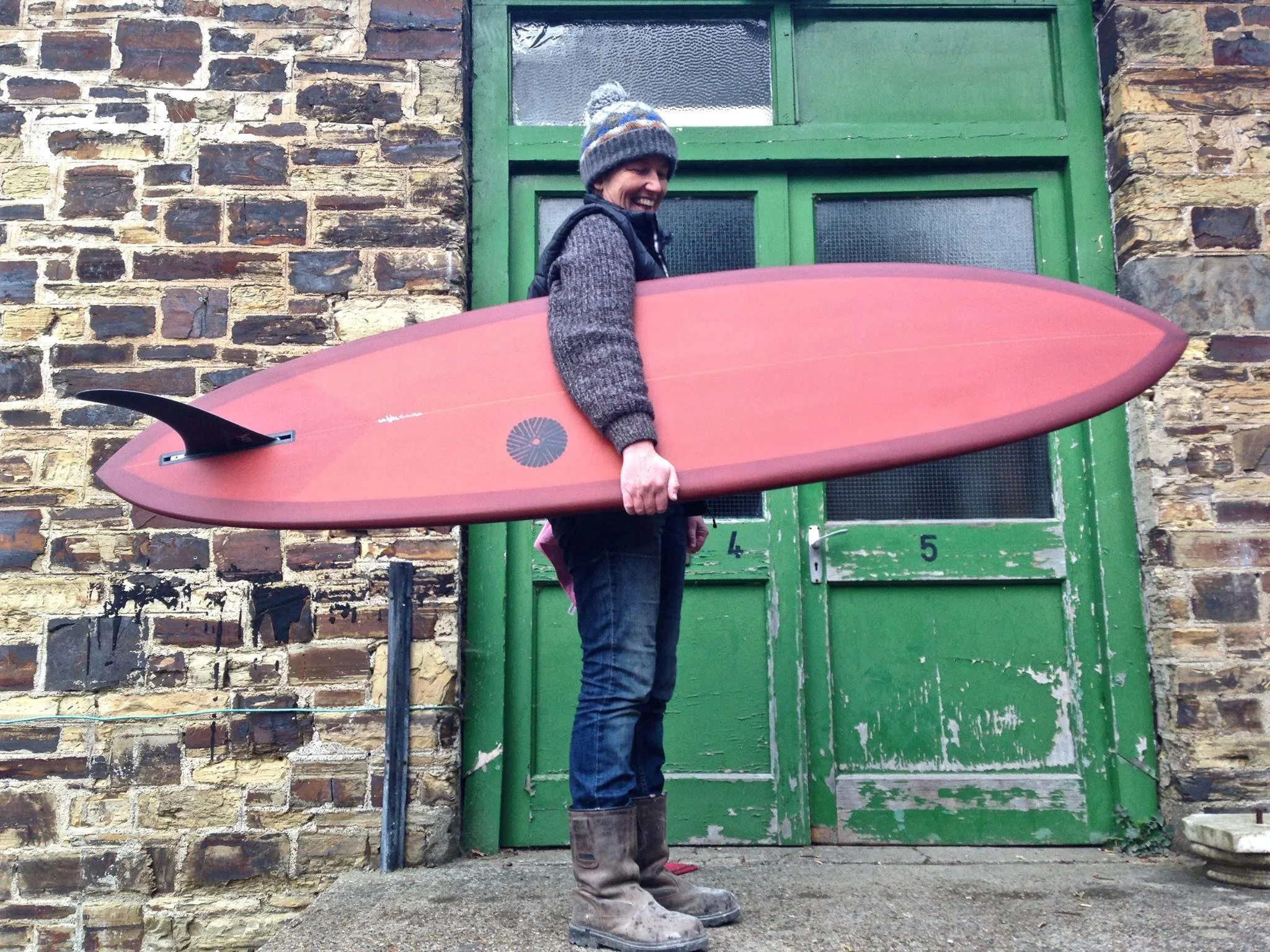 mctavish style tracker surfboard hand shaped with brick colour resin tint