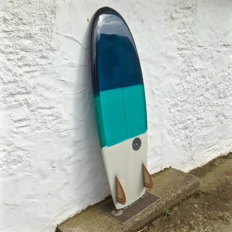 wooden keel twin fin surfboard mini Simmons style
