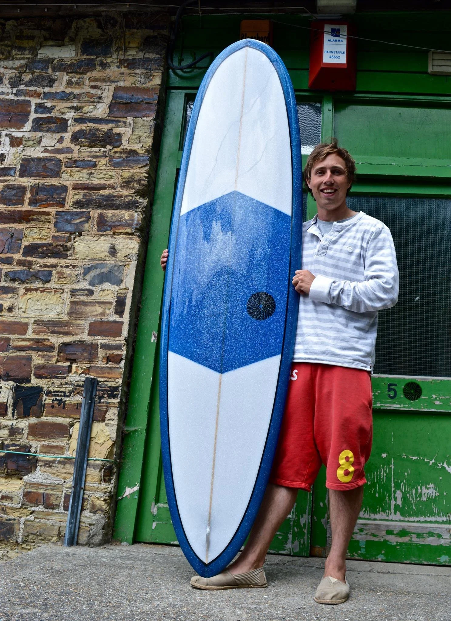 magic carpet style surfboard with glitter in resin tint 