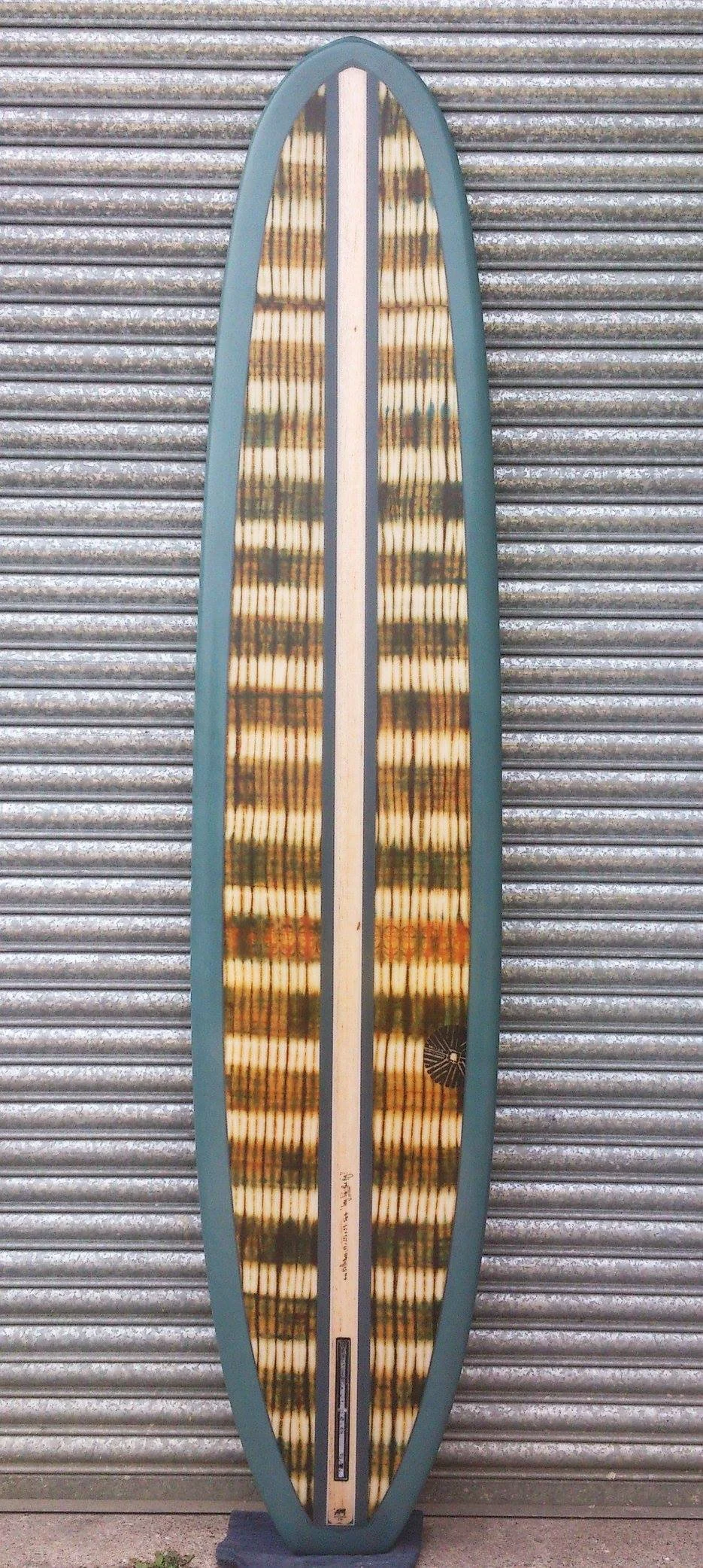 pig surfboard with African fabric inlay and balsa stringer