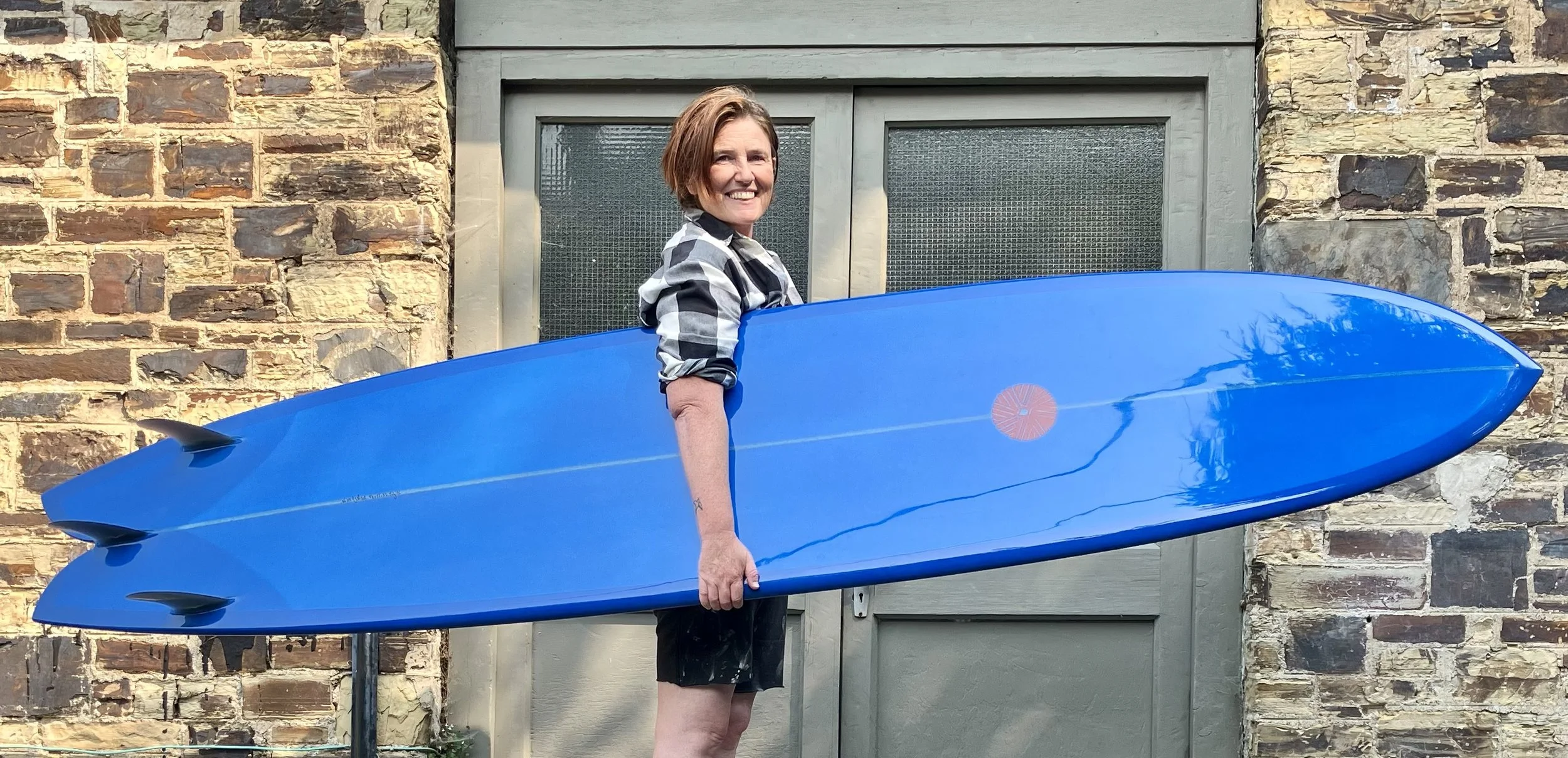 Blue resin tint glider fish surfboard