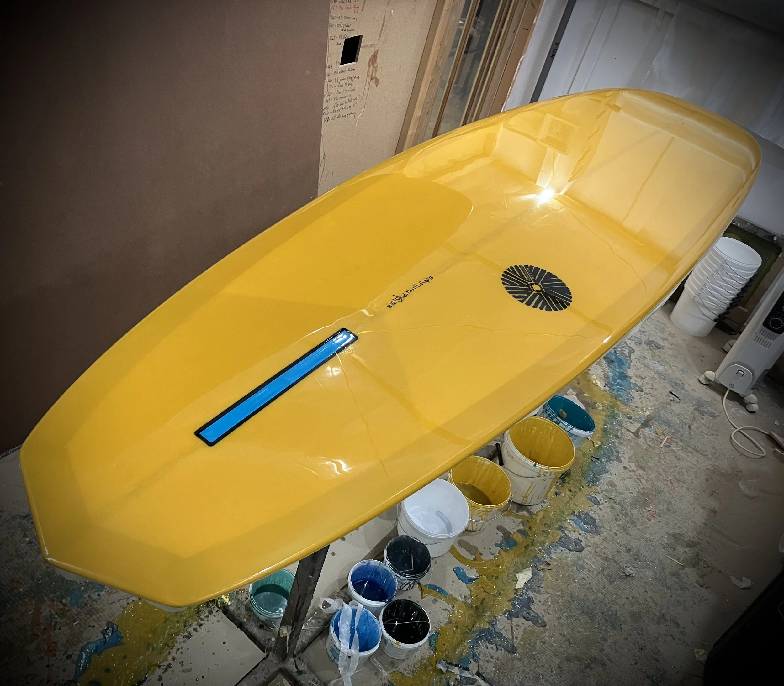 mustard yellow resin tint Evo mid length surfboard