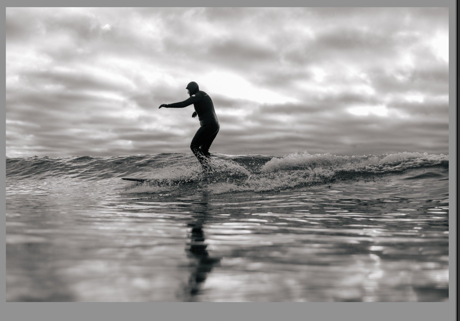 Surfing Westward Ho! beach on longboard Slider
