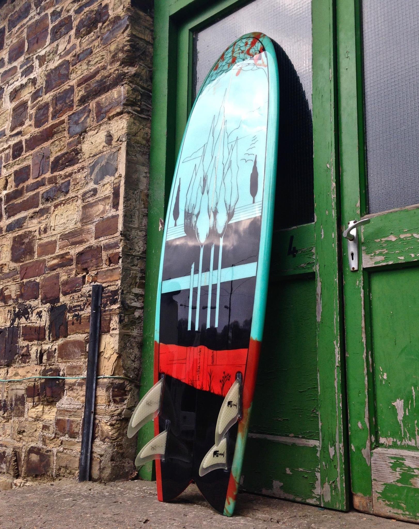bespoke surfboard artwork on swallow tail quad mini Simmons fish surfboard