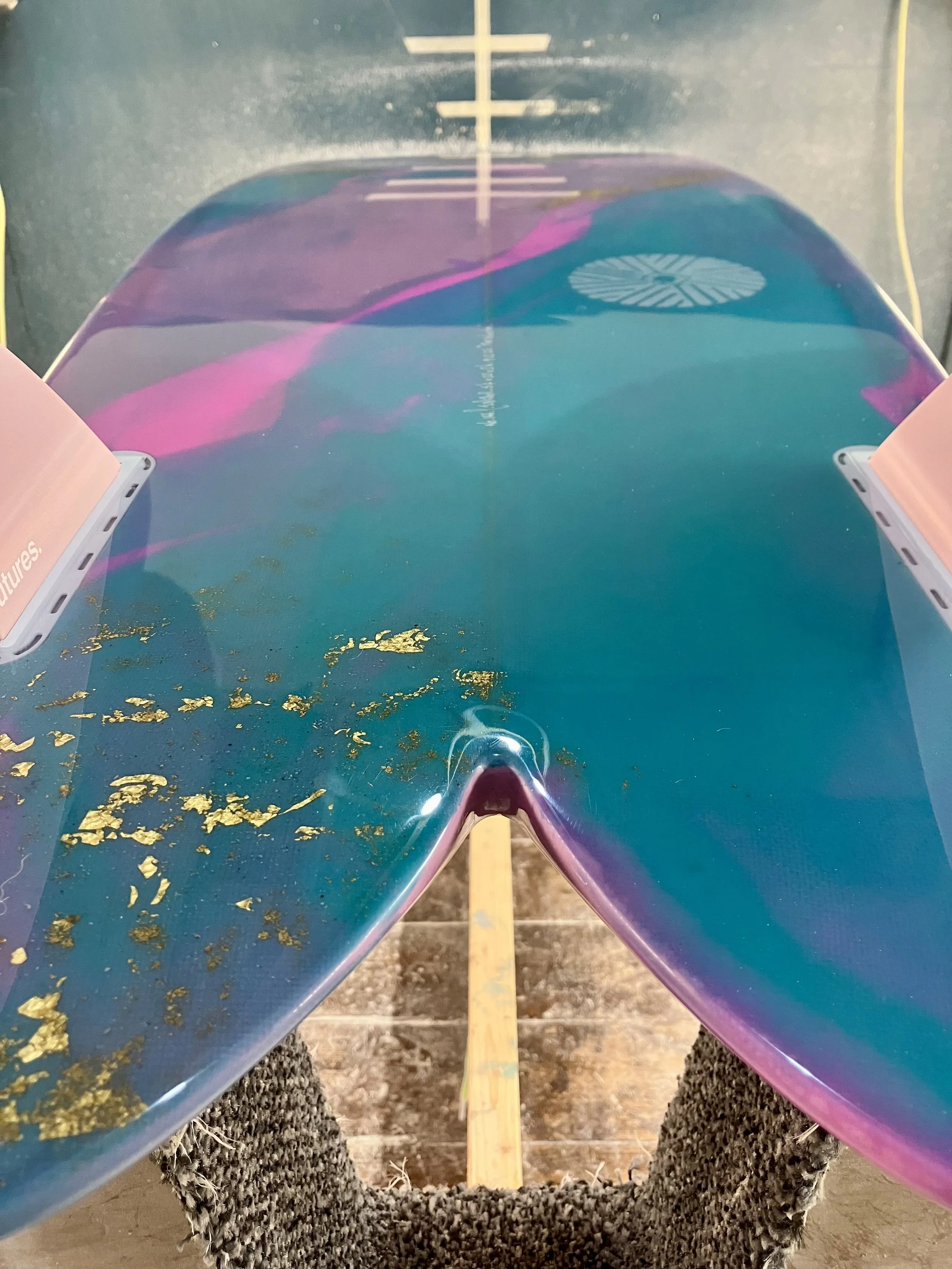 gold leaf and turquoise abstract resin tint twin fin fish surfboard