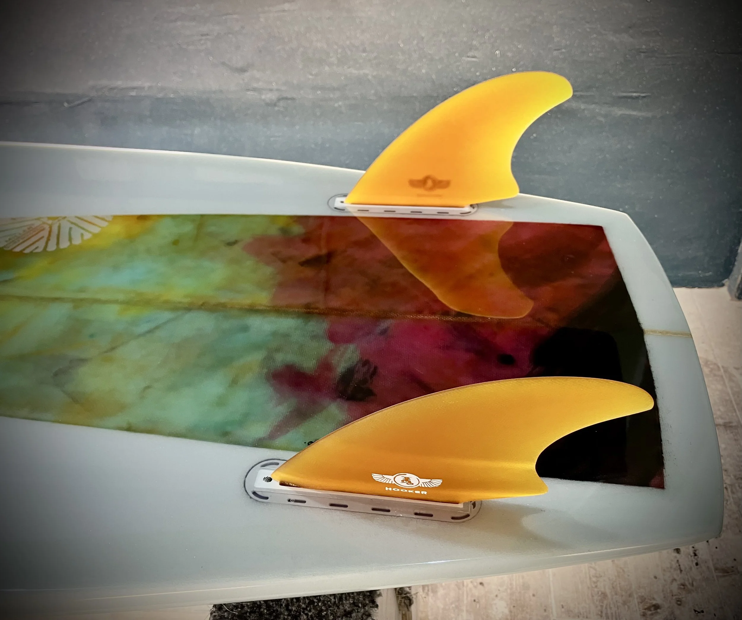custom resin panels on mini Simmons surfboard