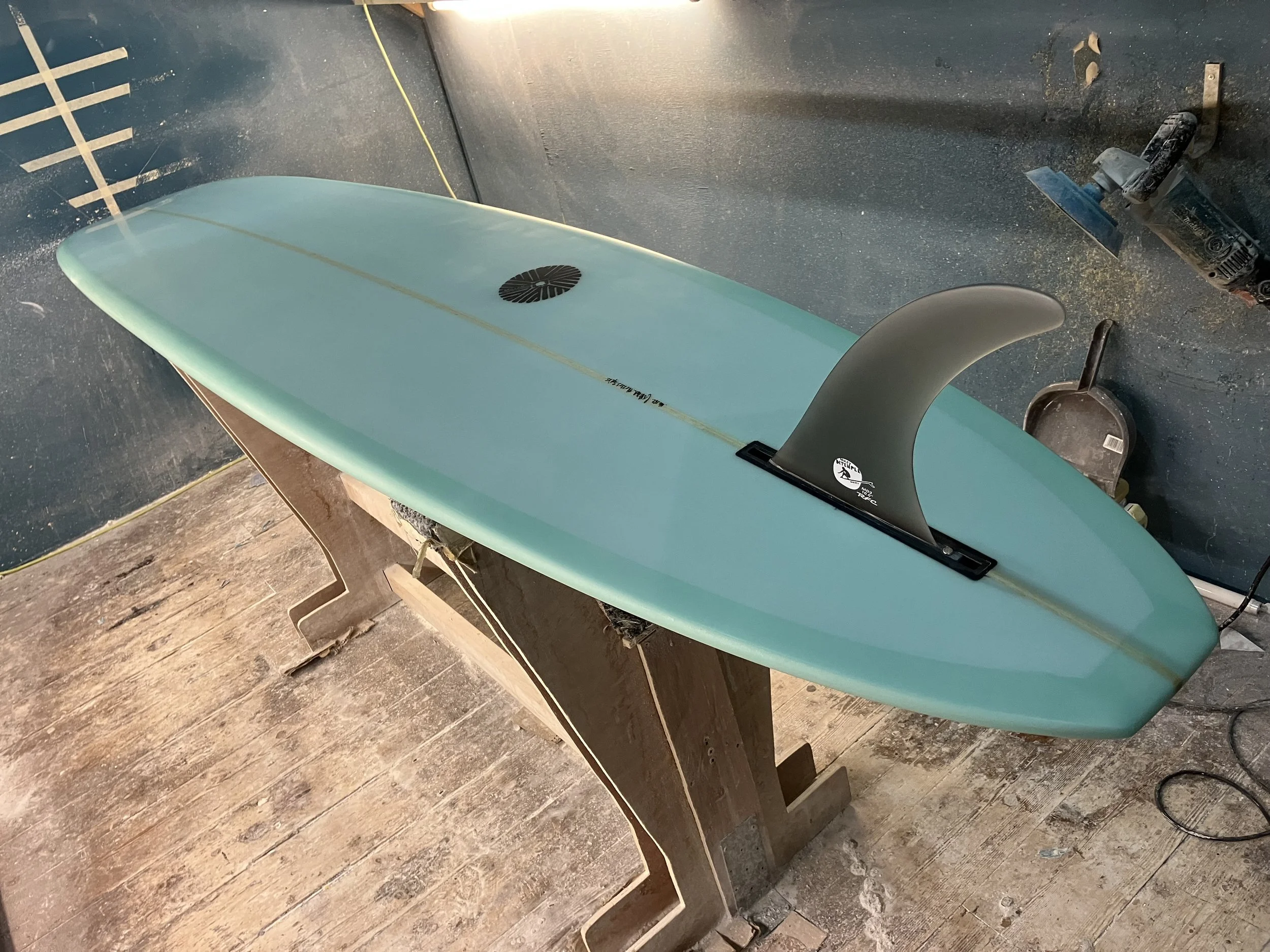 pale blue custom slider longboard with hard edge tail