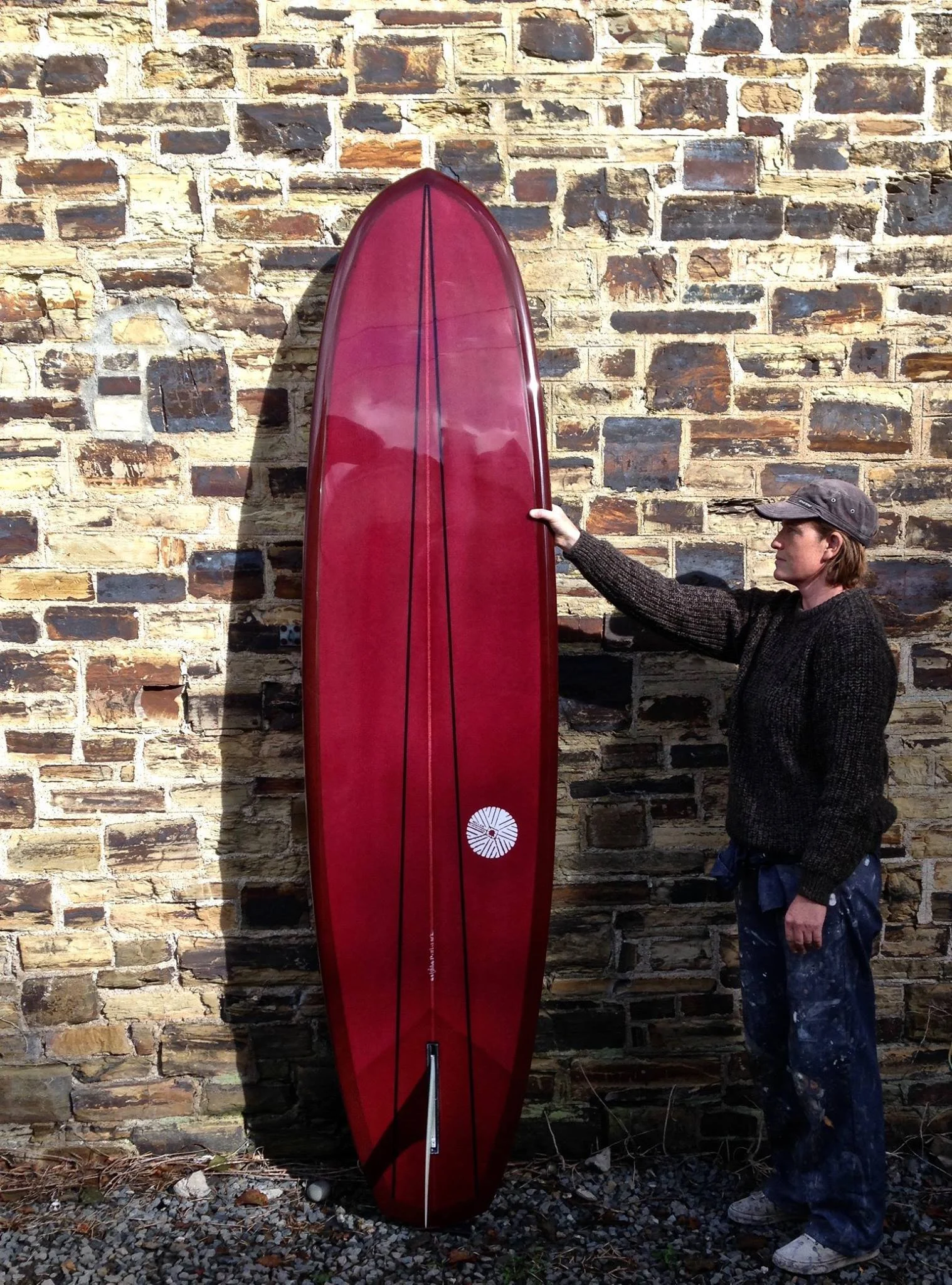 maroon resin tint mid length surfboard