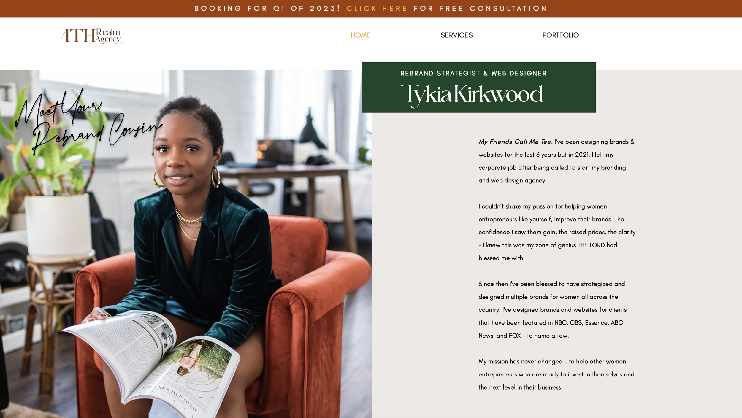 A woman sitting on an orange armchair indoors, holding an open magazine, with a potted plant on a side table to her left. She has short hair, gold earrings, and a green velvet blazer. There are desks and office equipment in the background, indicating a modern office space.