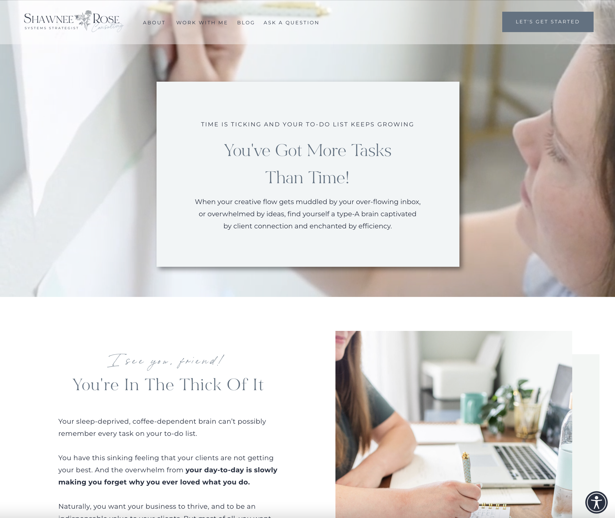 Screenshot of a business website homepage with text about managing tasks and productivity, featuring a woman working at a desk with a laptop and a notebook.