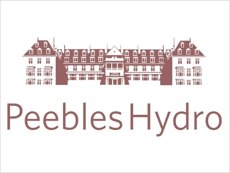 Illustration of a large, historic building with turrets and multiple windows, with the text "Peebles Hydro" underneath.
