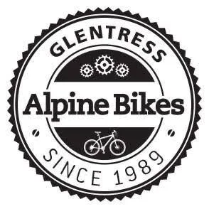 A black and white circular badge featuring the text "Glentress" at the top, "Alpine Bikes" in the center with a bicycle icon below, and "Since 1989" at the bottom, with gear icons at the top.