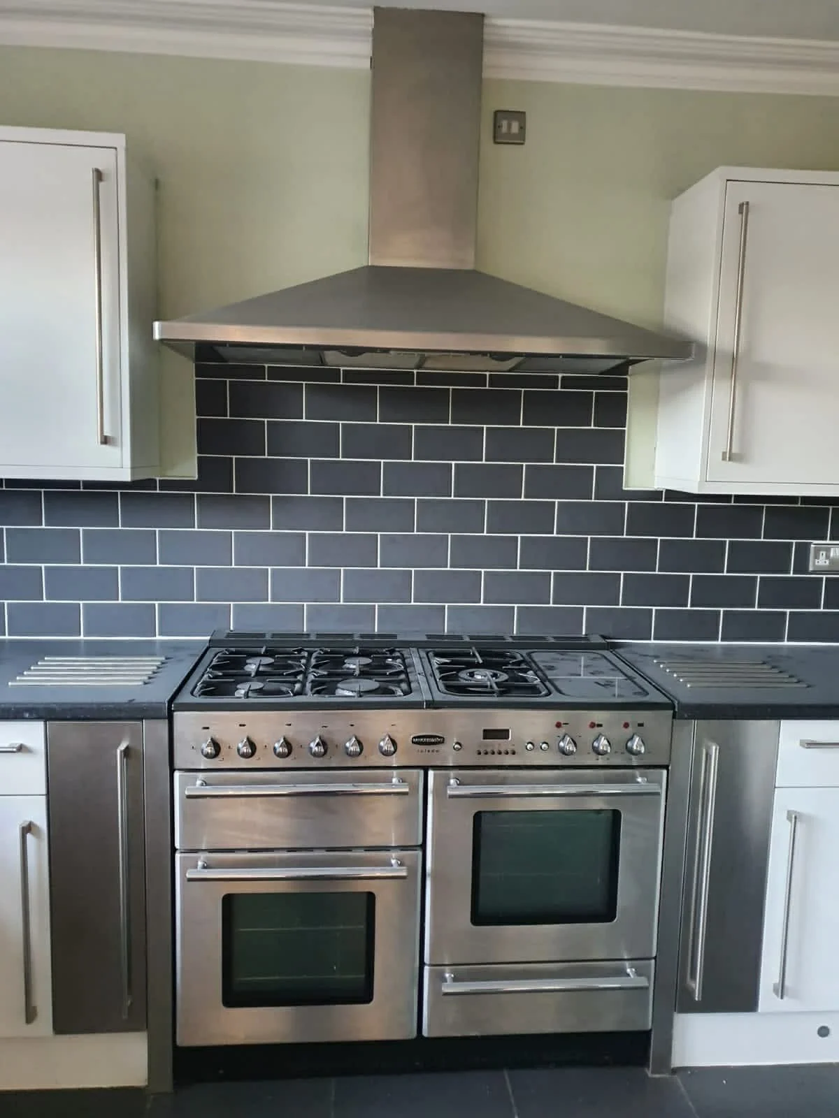 Deep cleaned kitchen appliances and surfaces leaving the space spotless and hygenic