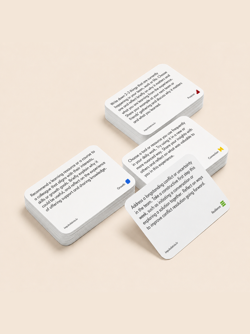 Stack of cards with printed text on a beige background, each card providing advice about learning resources, growth, connection, and resilience.