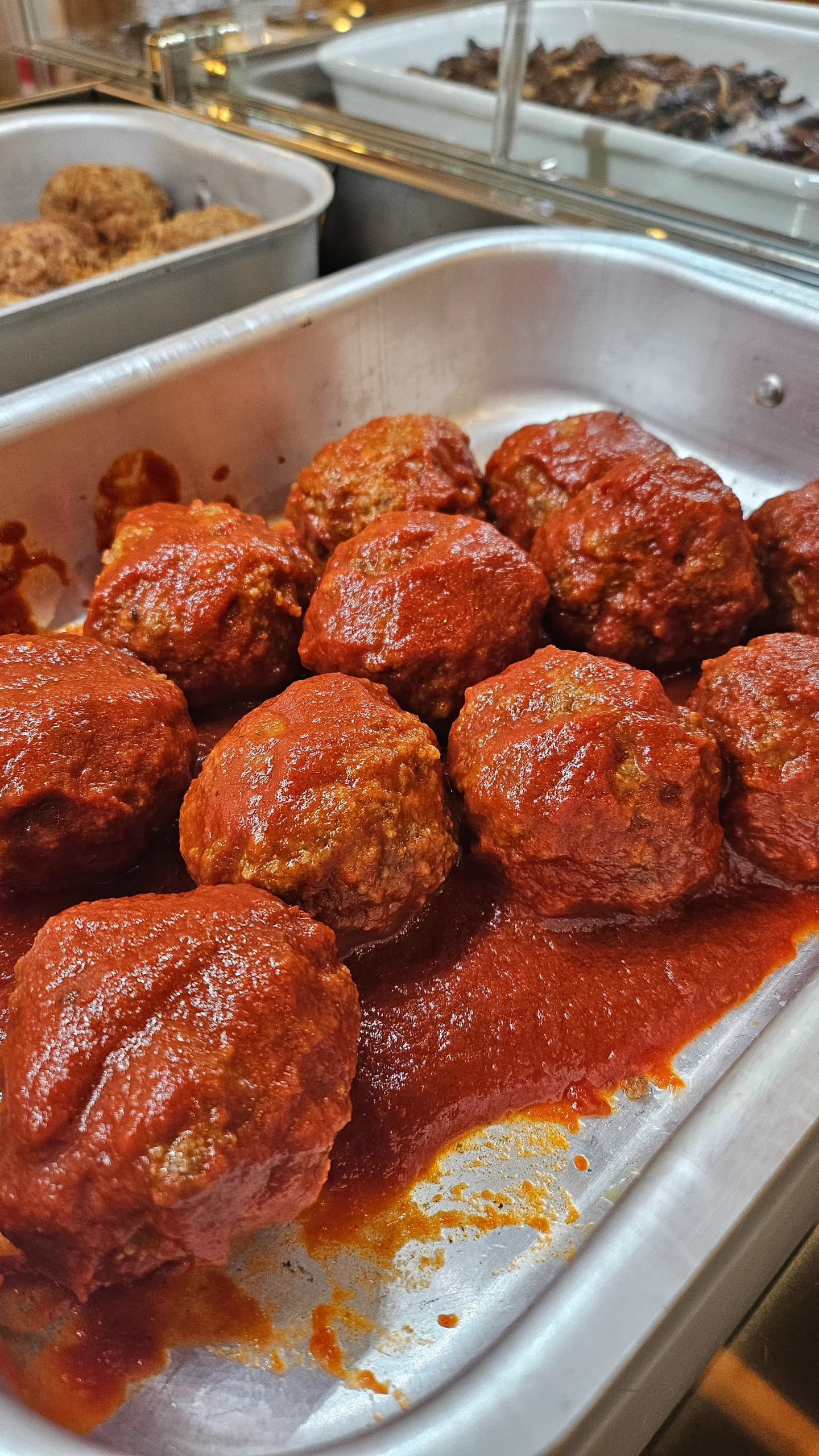 Polpette al sugo preparate secondo la tradizione, morbide e saporite, come a casa