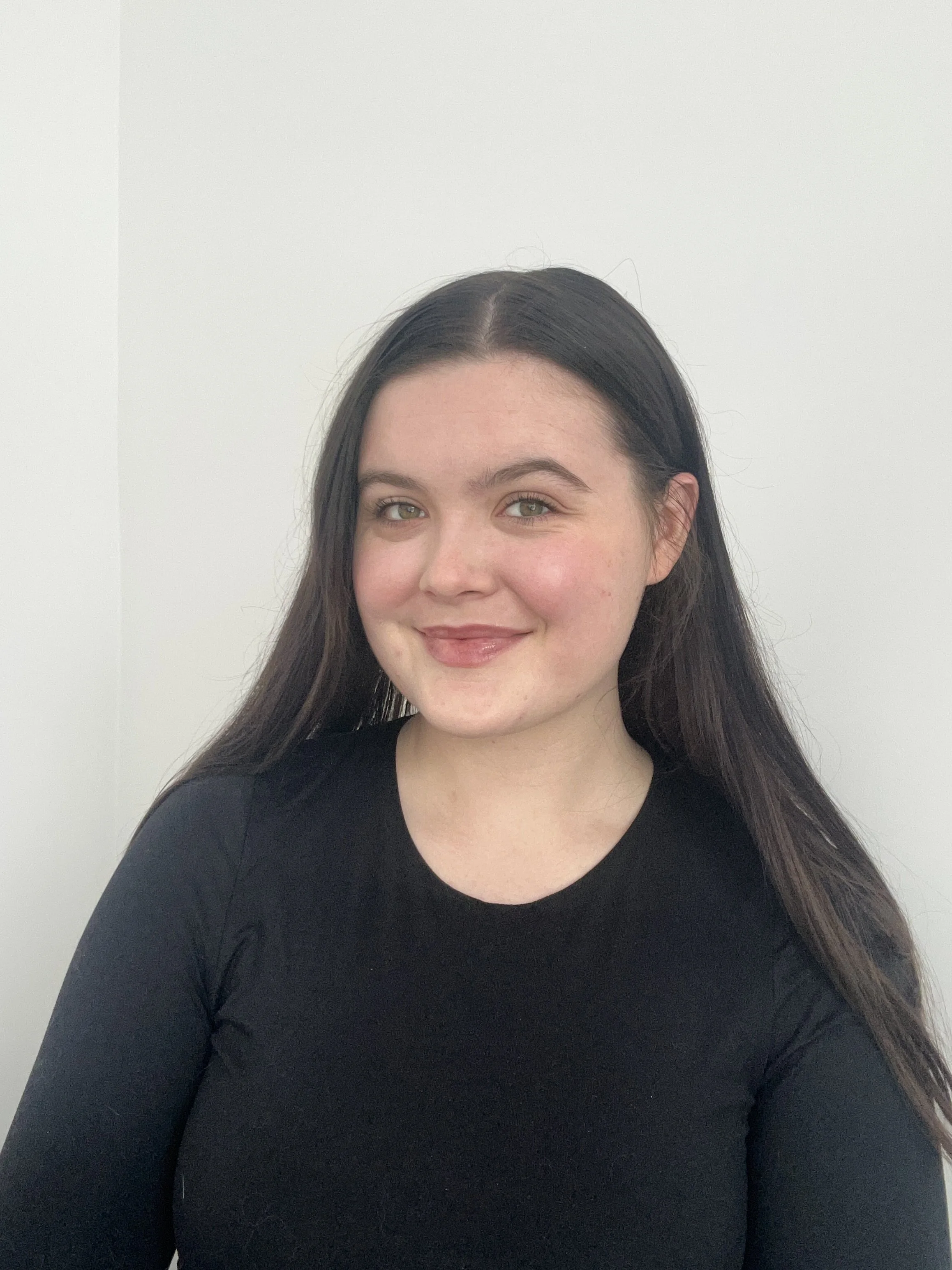 Abi Mack smiling into the camera