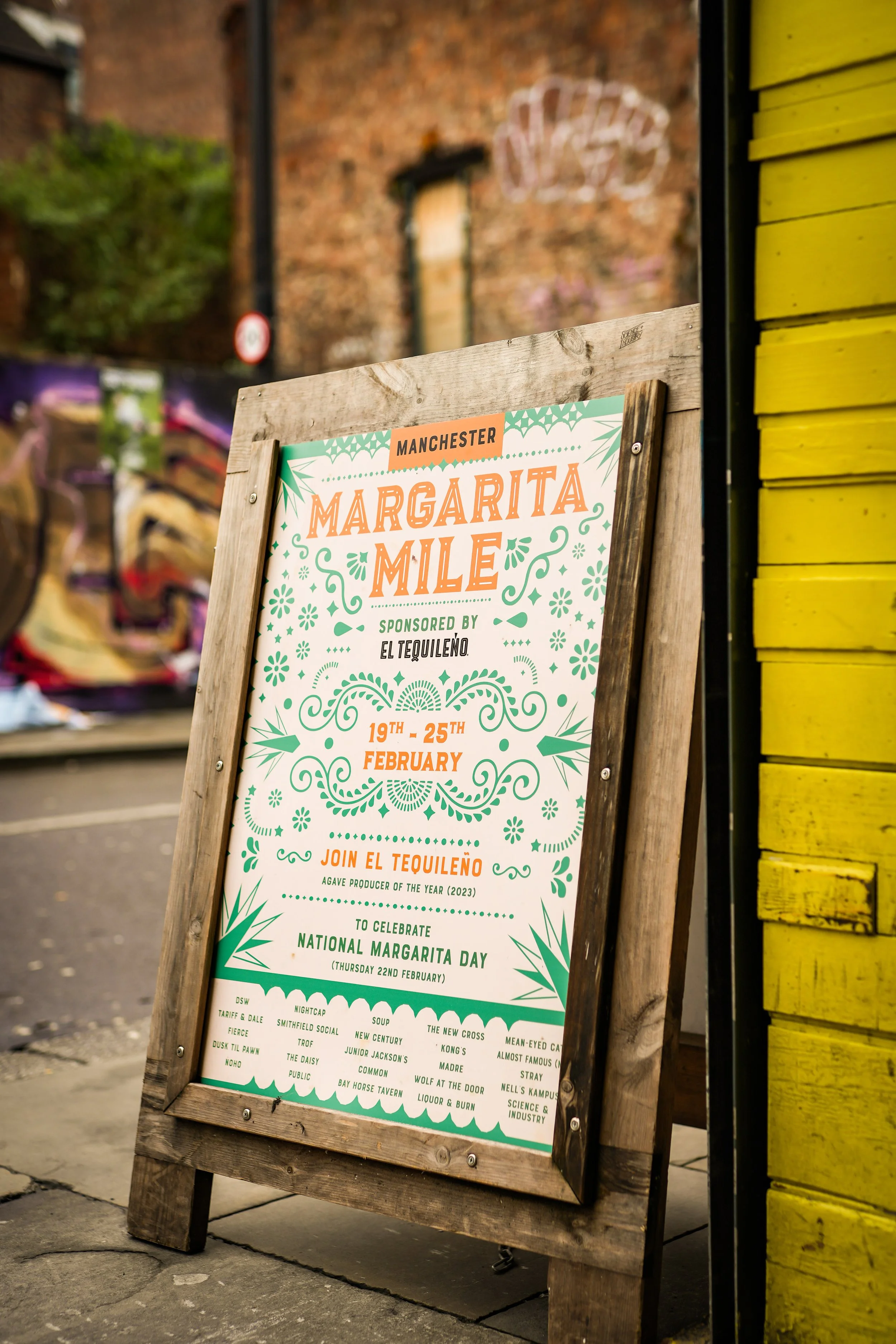 Event poster for Margarita Mile festival in Manchester, sponsored by El Tequileño, taking place from February 19th to 25th, celebrating National Margarita Day on February 22nd.