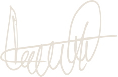 Signature handwriting in white on black background