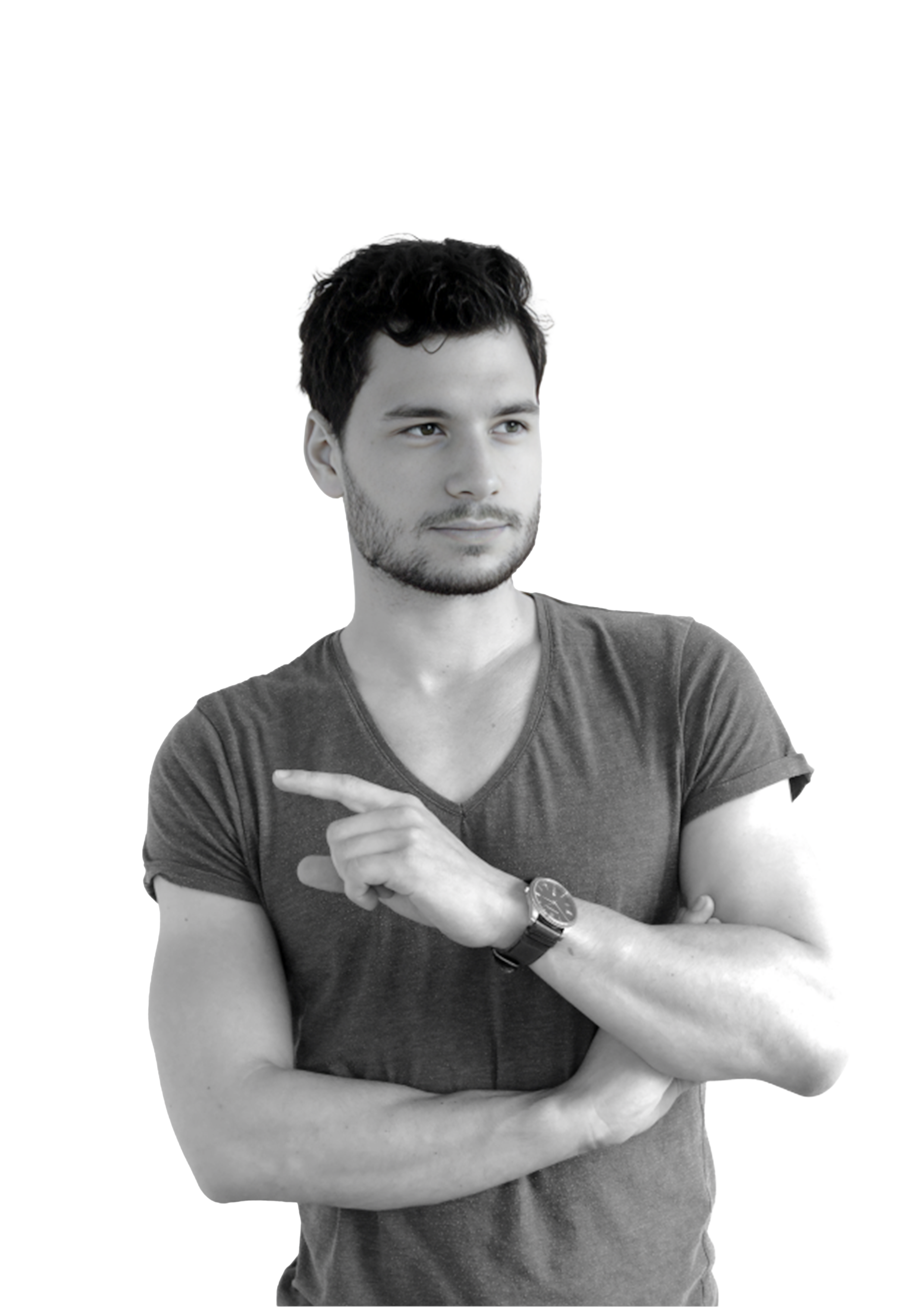 Young man with dark hair and beard, wearing a t-shirt and watch, pointing with his index finger to the side, looking thoughtfully.