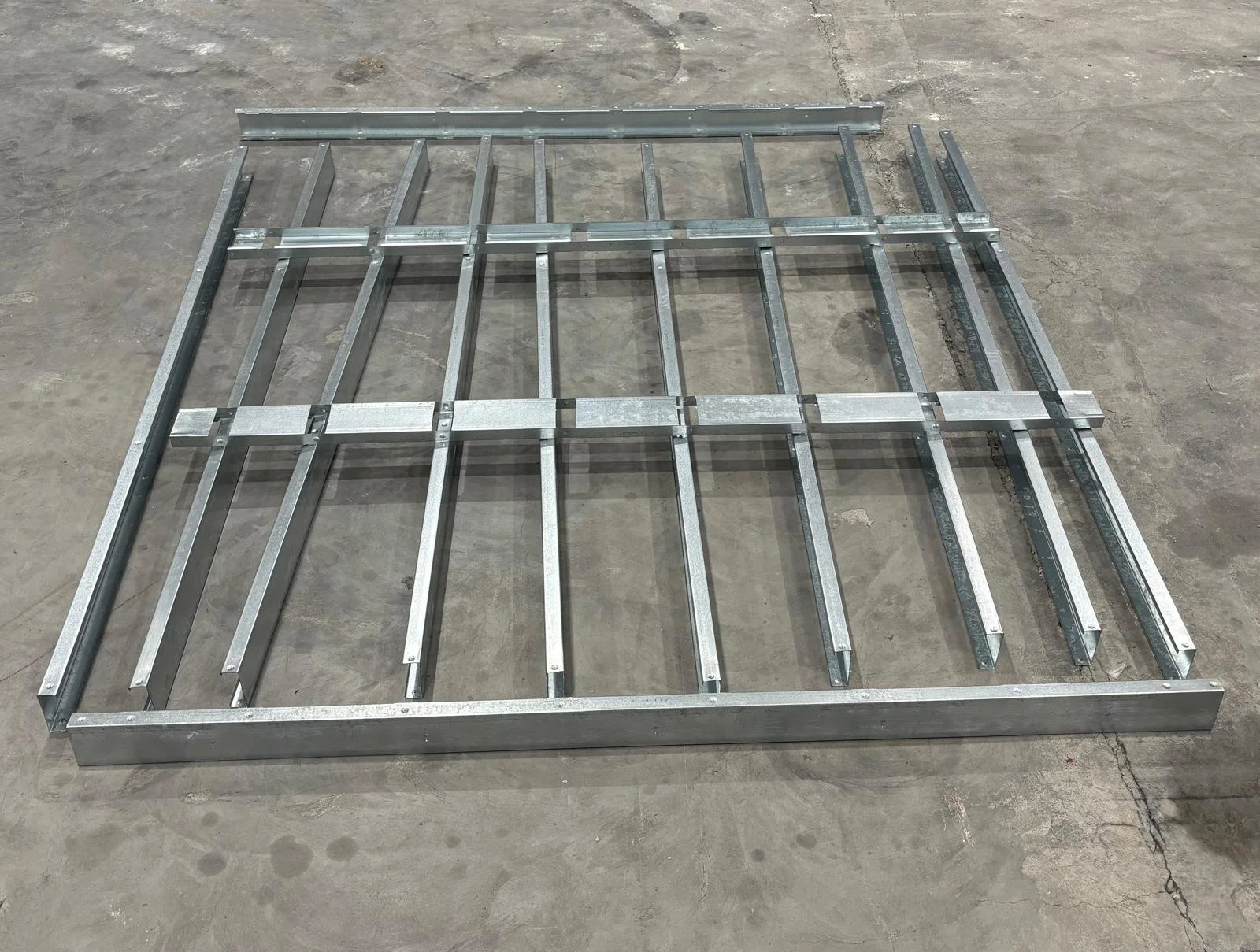 floor of steel frame garden room set up to be connected