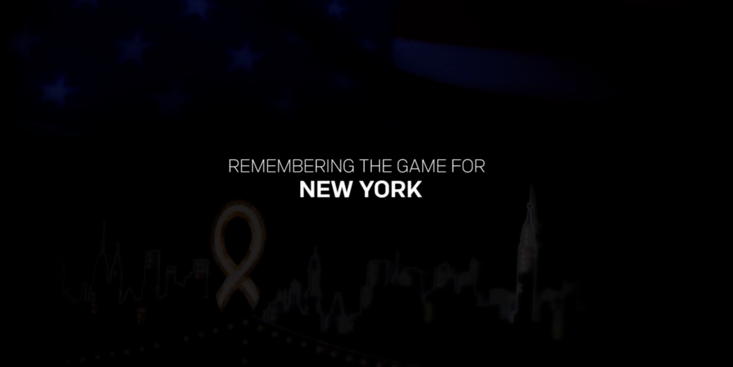 Dark background with an American flag in the top left corner and the New York City skyline silhouette at the bottom. Text in the center reads 'Remembering the game for New York'.