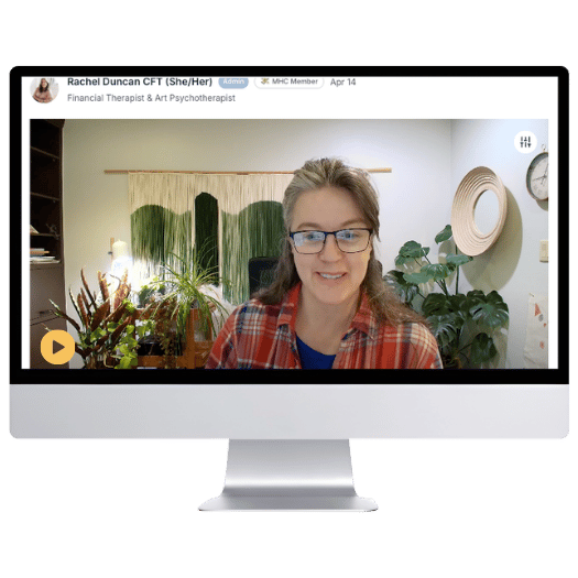 desktop computer with a screenshot of a woman talking to the camera