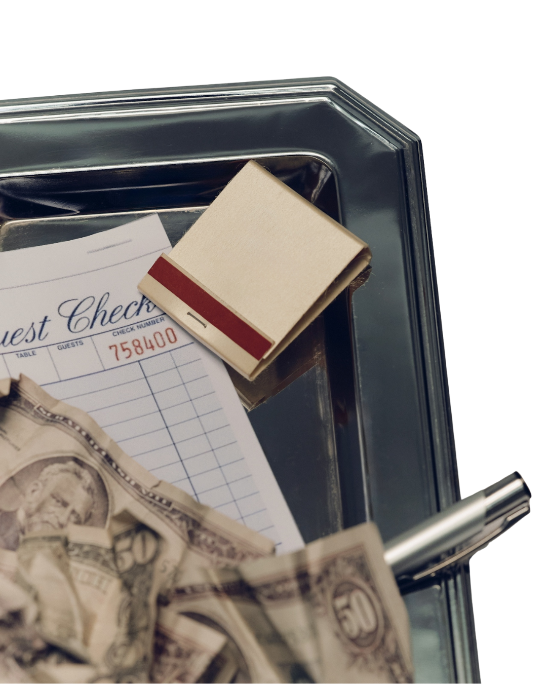 A restaurant checkout tray with a check, crumpled fifty dollar bill.