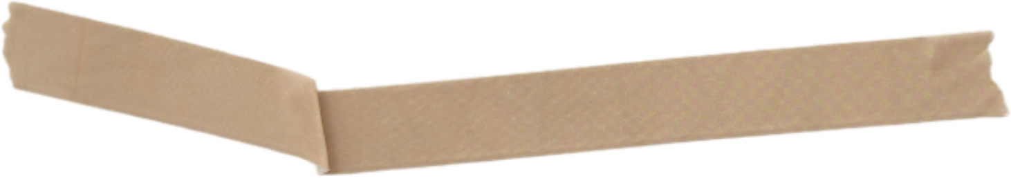 Close-up of a wrapped gift with beige paper and a red ribbon on a white surface.