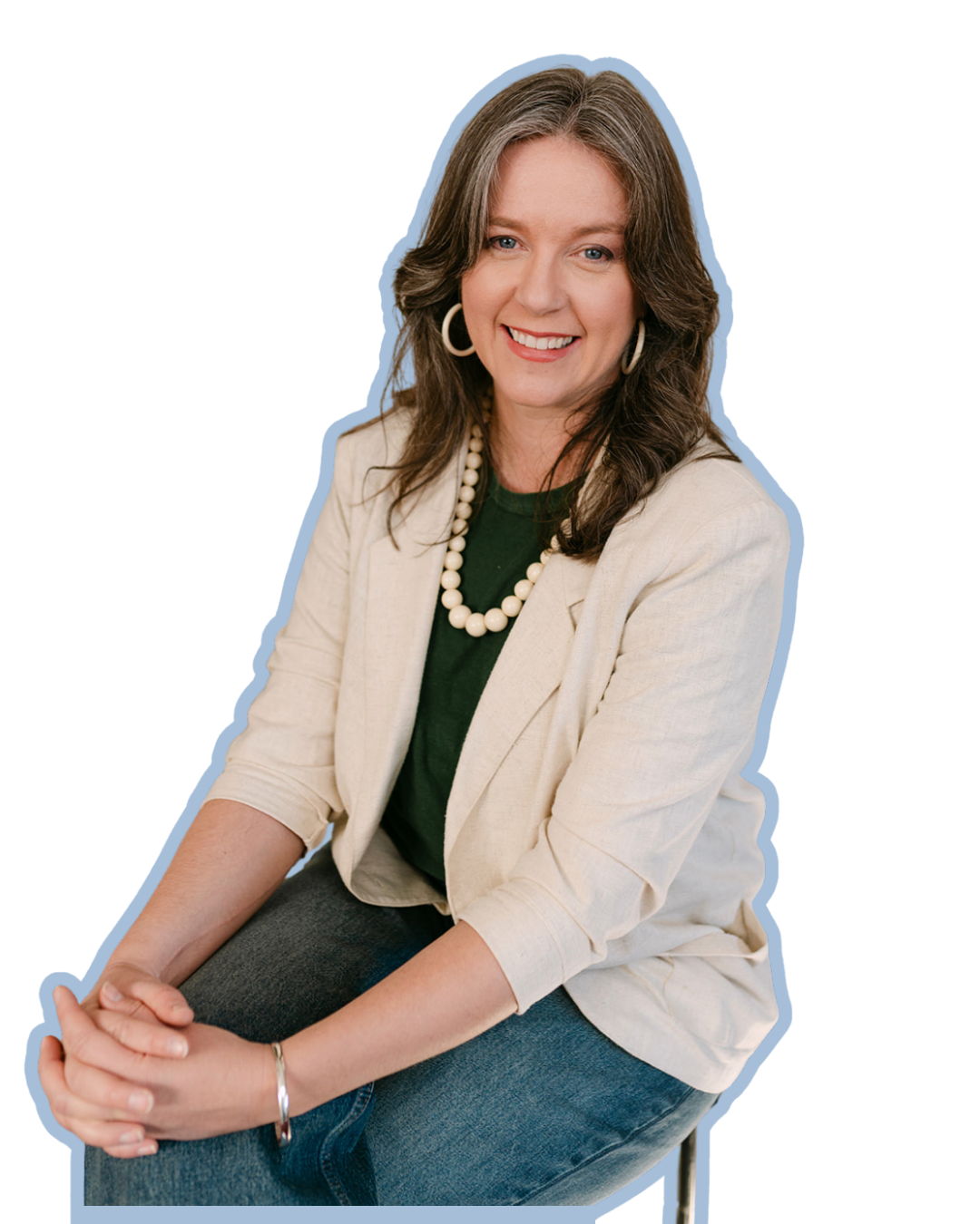 Rachel seated smiling at camera