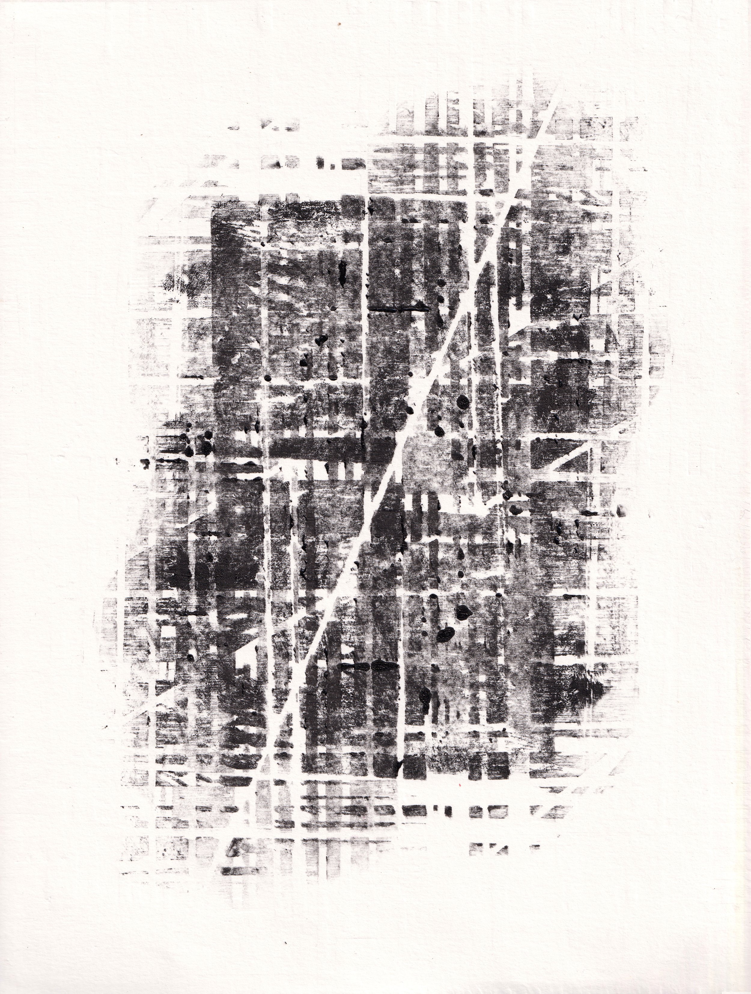 Une image en noir et blanc d'une carte urbaine ou plan de ville, avec des rues et intersections visibles.