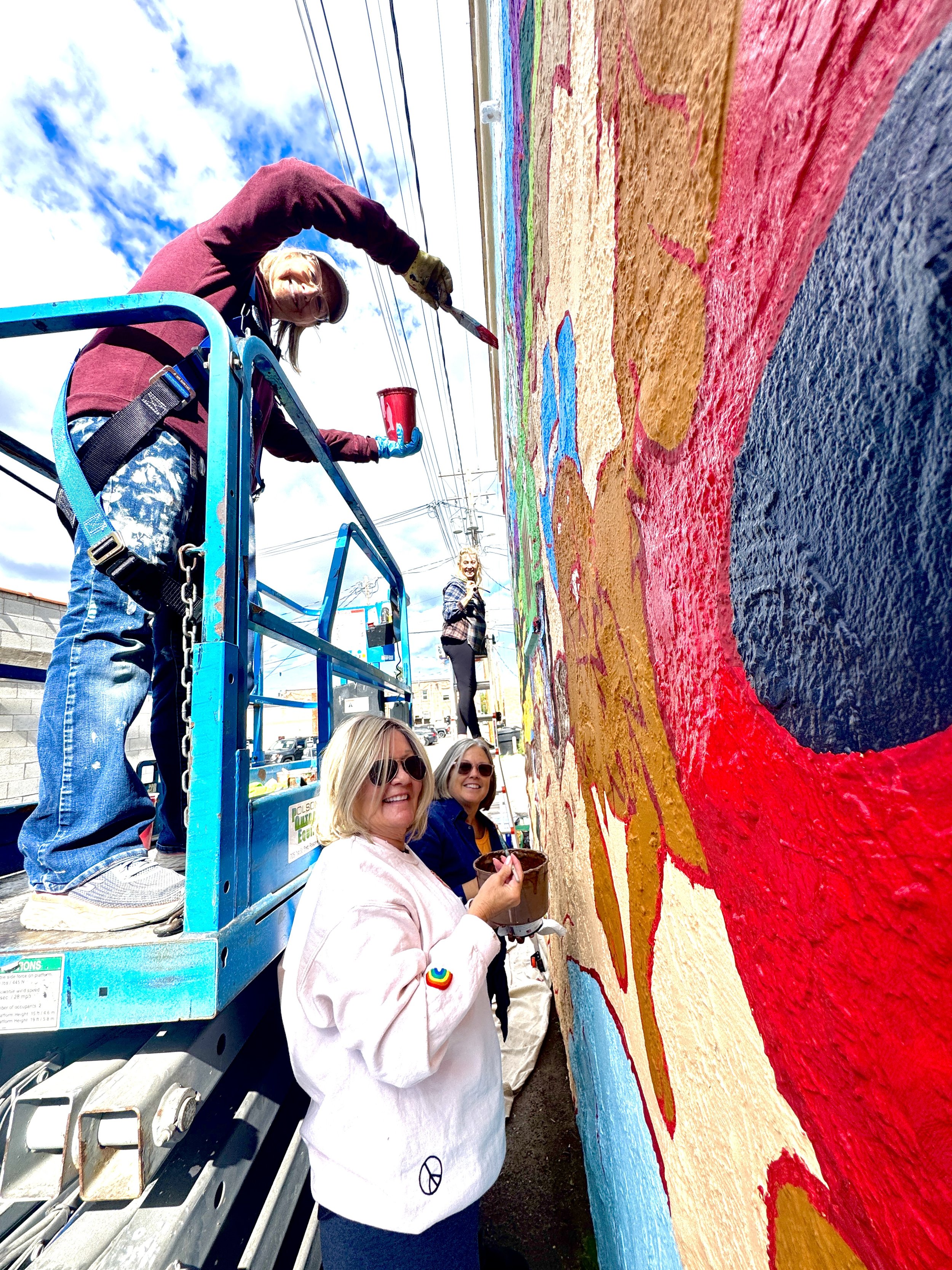 Vicky Poole painting with others at The Barking Lot 