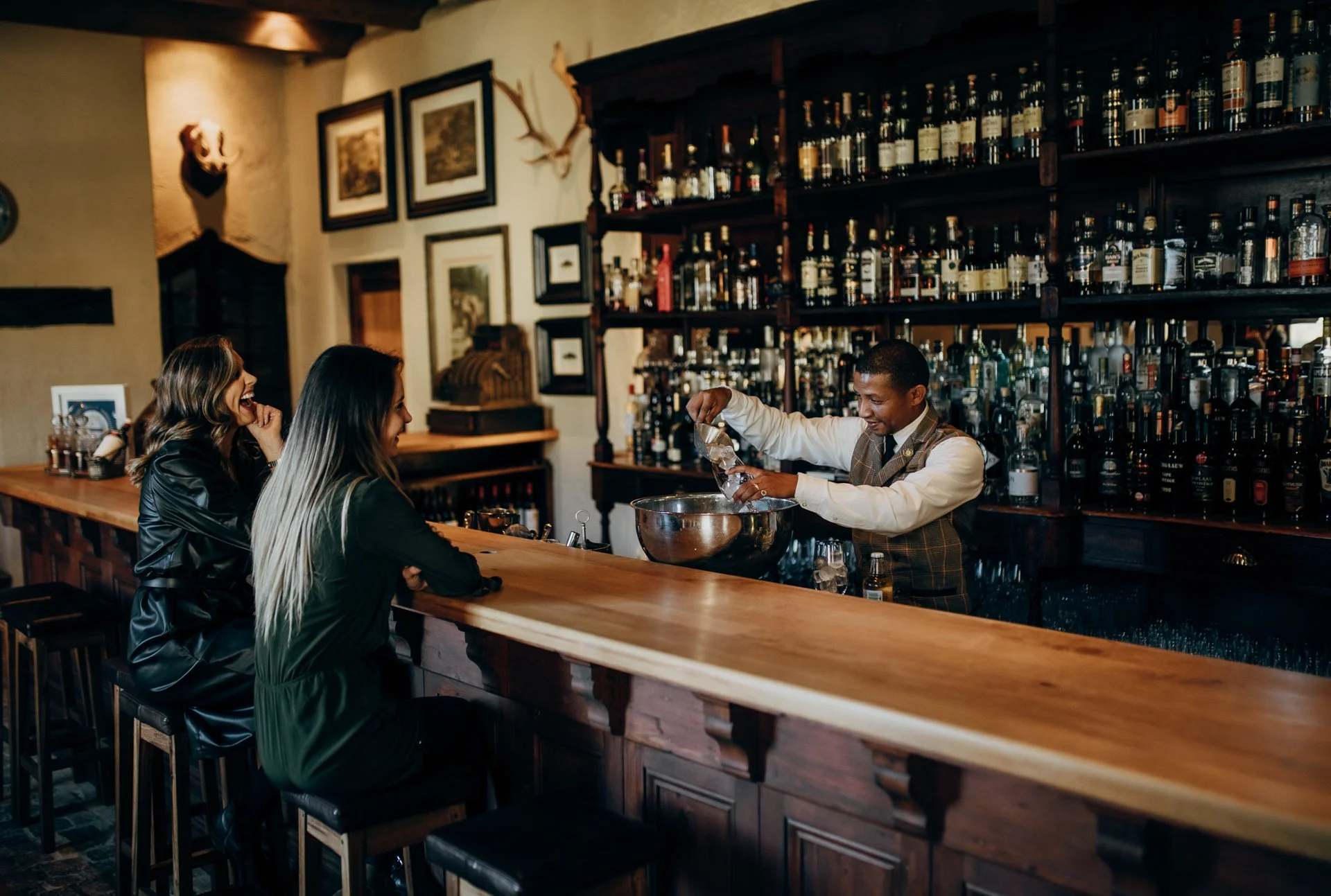 Classic long bar to celebrate (and commiserate) your playing partners