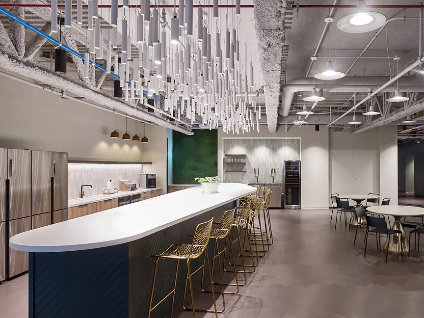 Interior office photo of Slalom Consulting's employee kitchen and dining area
