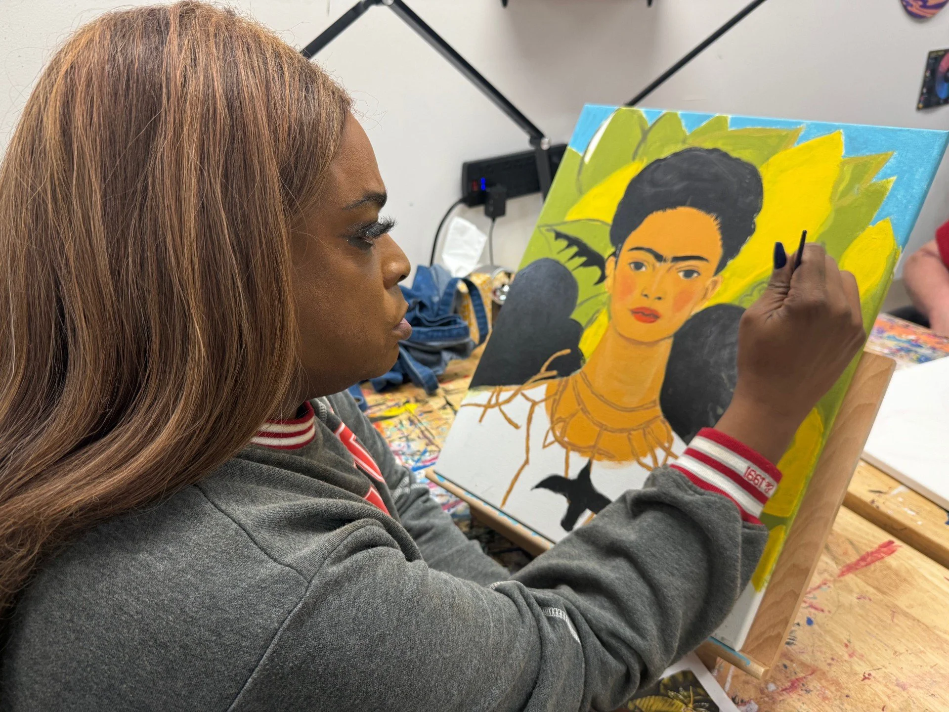 TBI resident participating in an art group therapy session at MARC rehabilitation center in Novi, Michigan