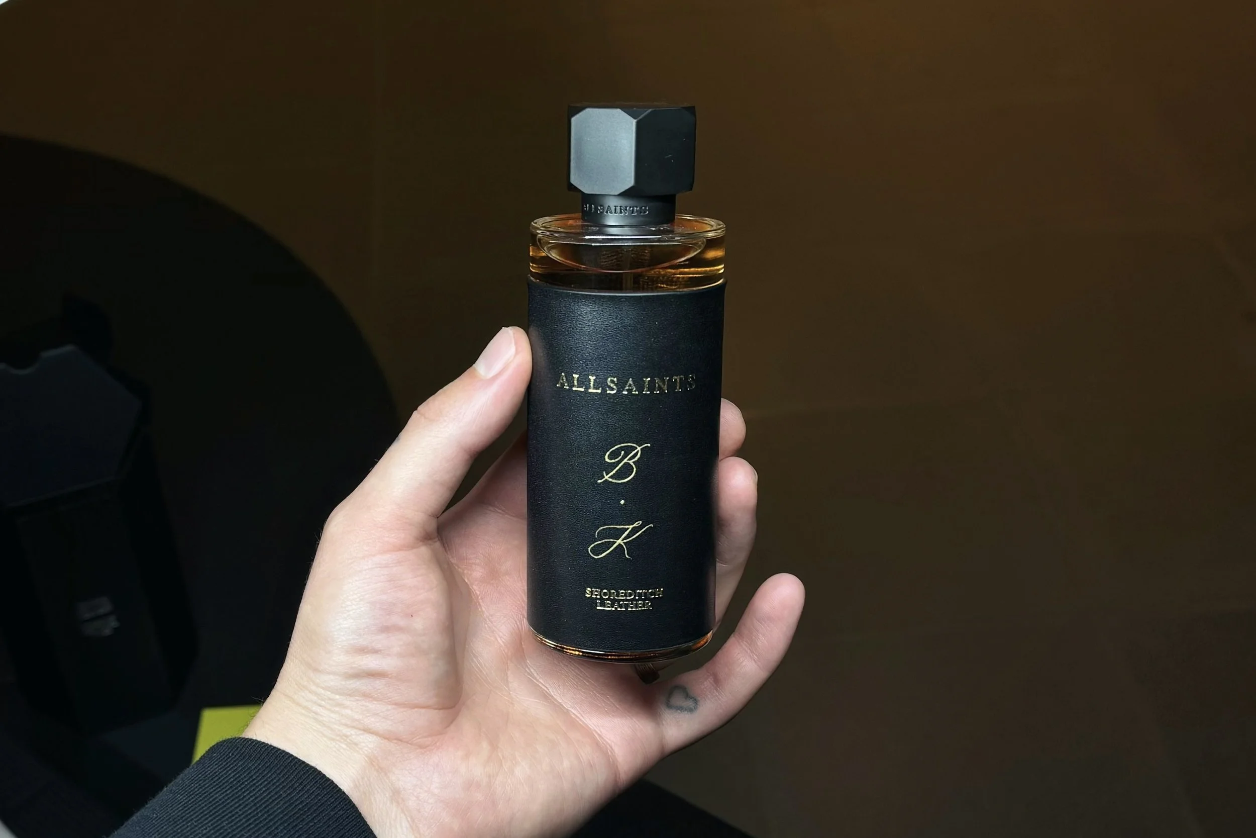 Bespoke leather perfume bottle customised for All Saints 