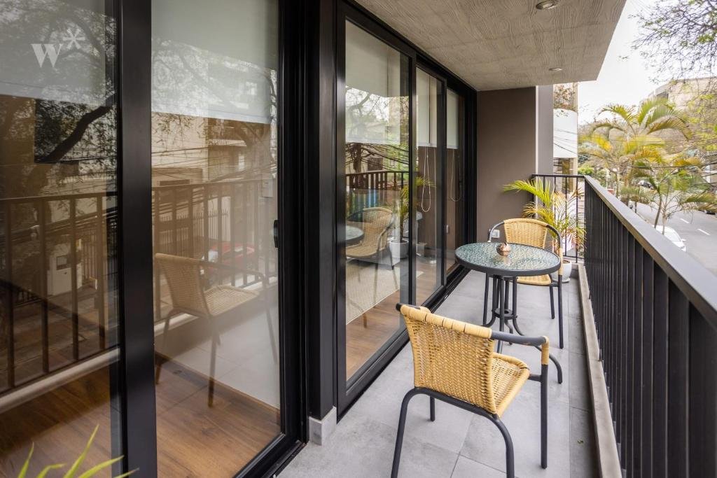 edificio multifamiliar alcanfores 1262 ventanas y mamparas volterra