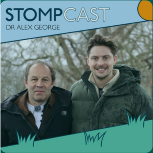 Cover image for the STOMPCast podcast featuring Dr. Alex George, showing two men outdoors, with trees in the background, both smiling and wearing jackets.