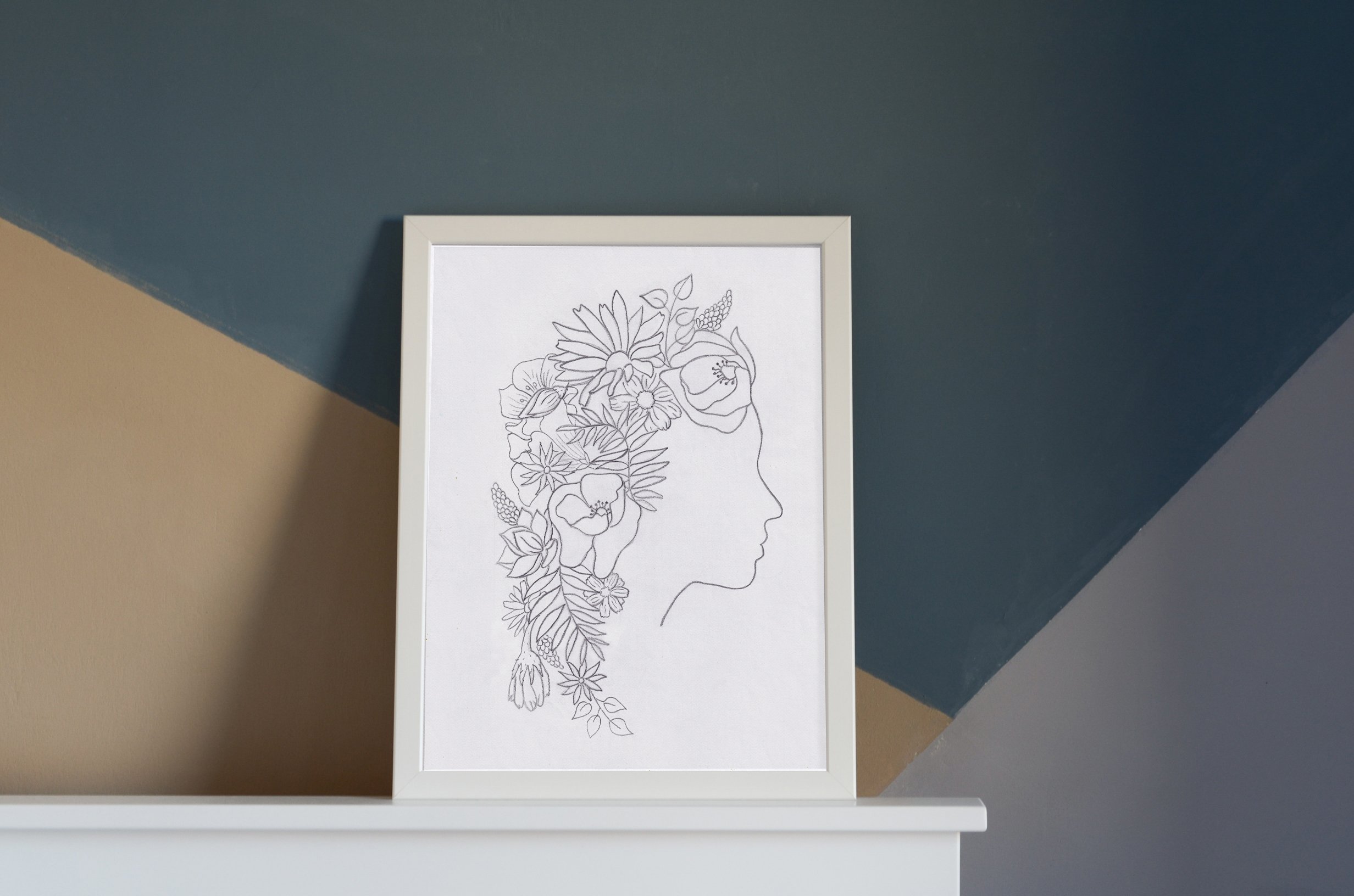 flowerhair White frame above fireplace.jpg