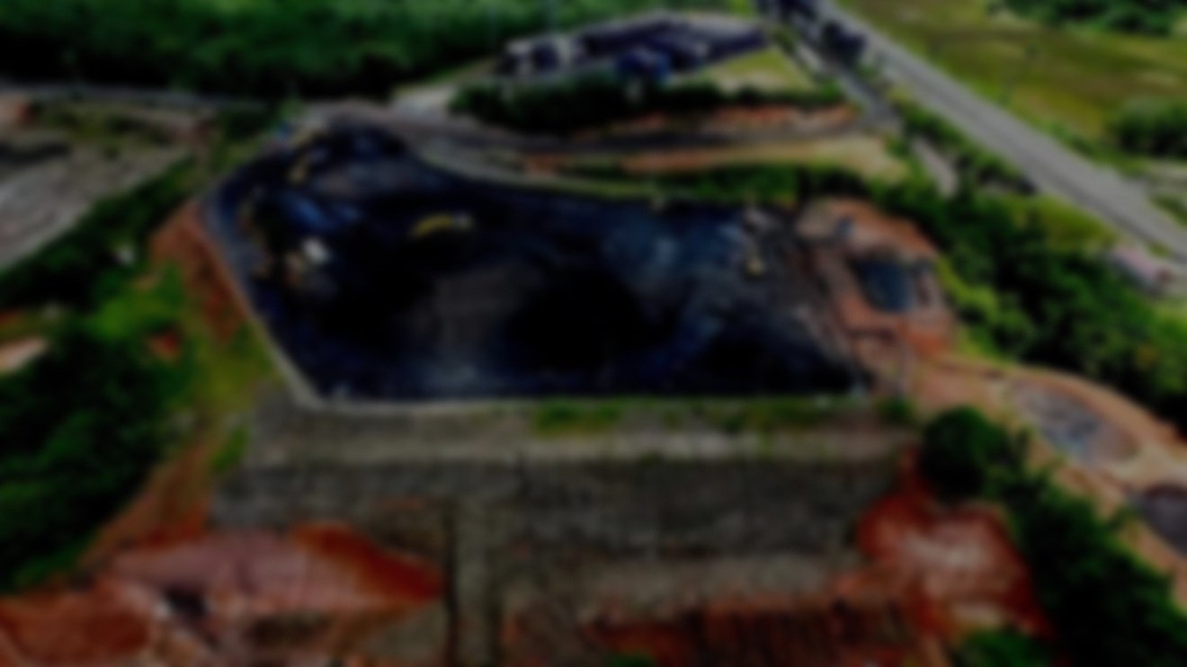 Exterior view of a building with a large sign for 'Motor Sights,' featuring three blue squares and the tagline 'Leading In Service Innovation.'