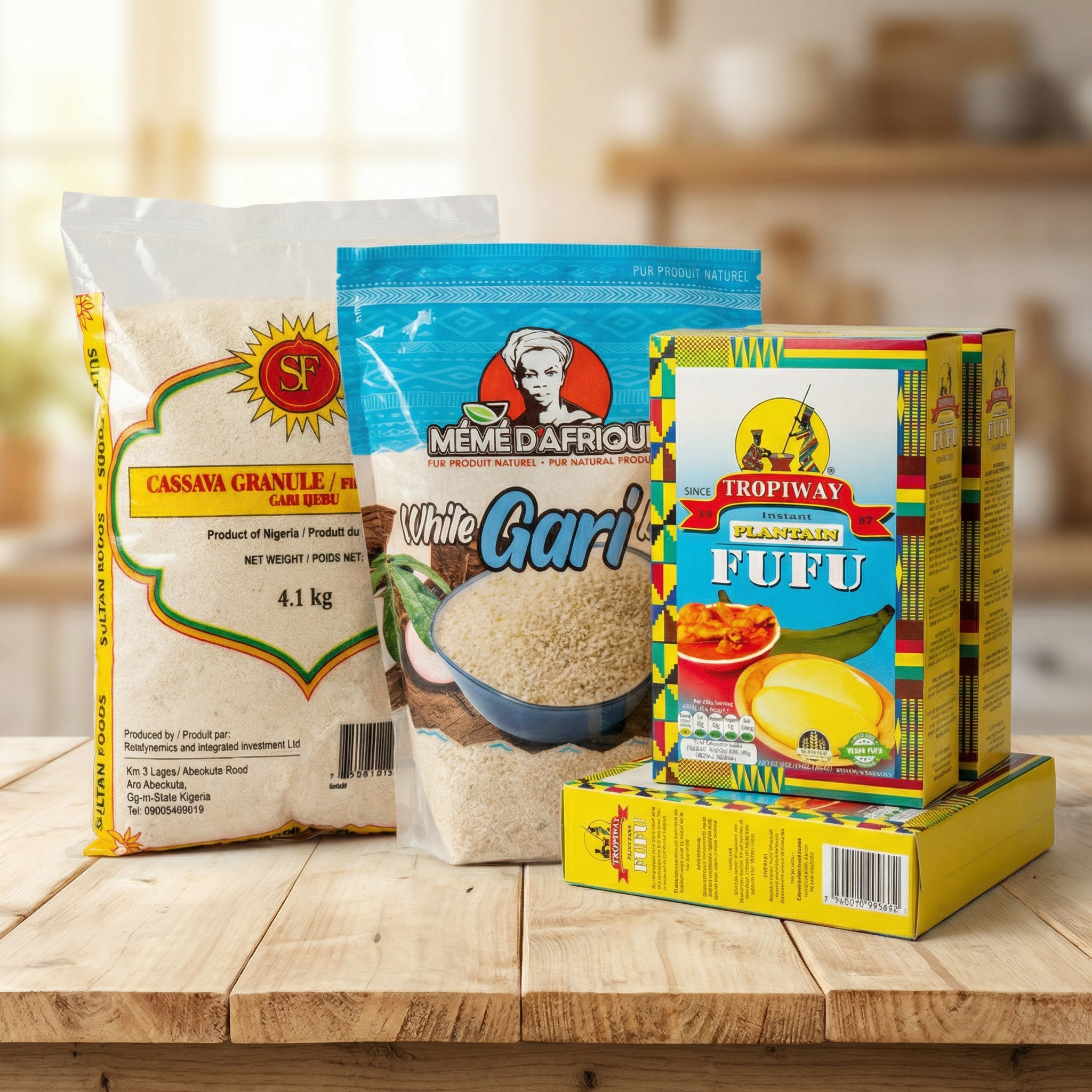 Assorted Nigerian food ingredients on a wooden table, including cassava flour, white gari, and instant plantain fufu