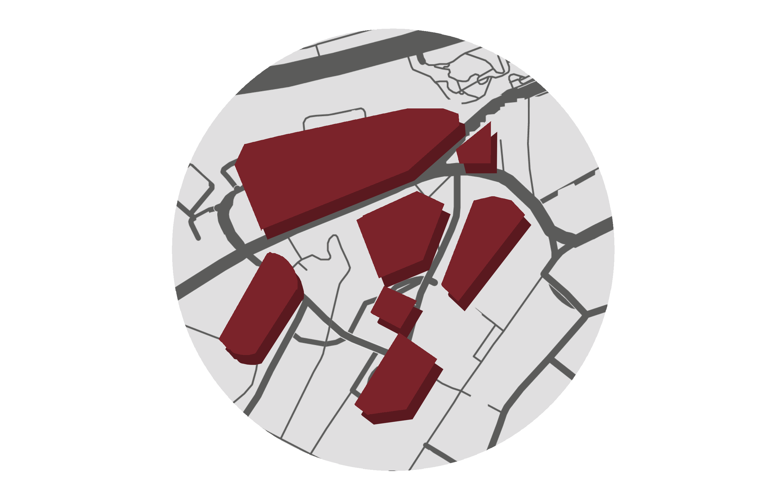 A map with several large buildings highlighted in dark red, surrounded by roads and other smaller structures, with some areas in gray and black.