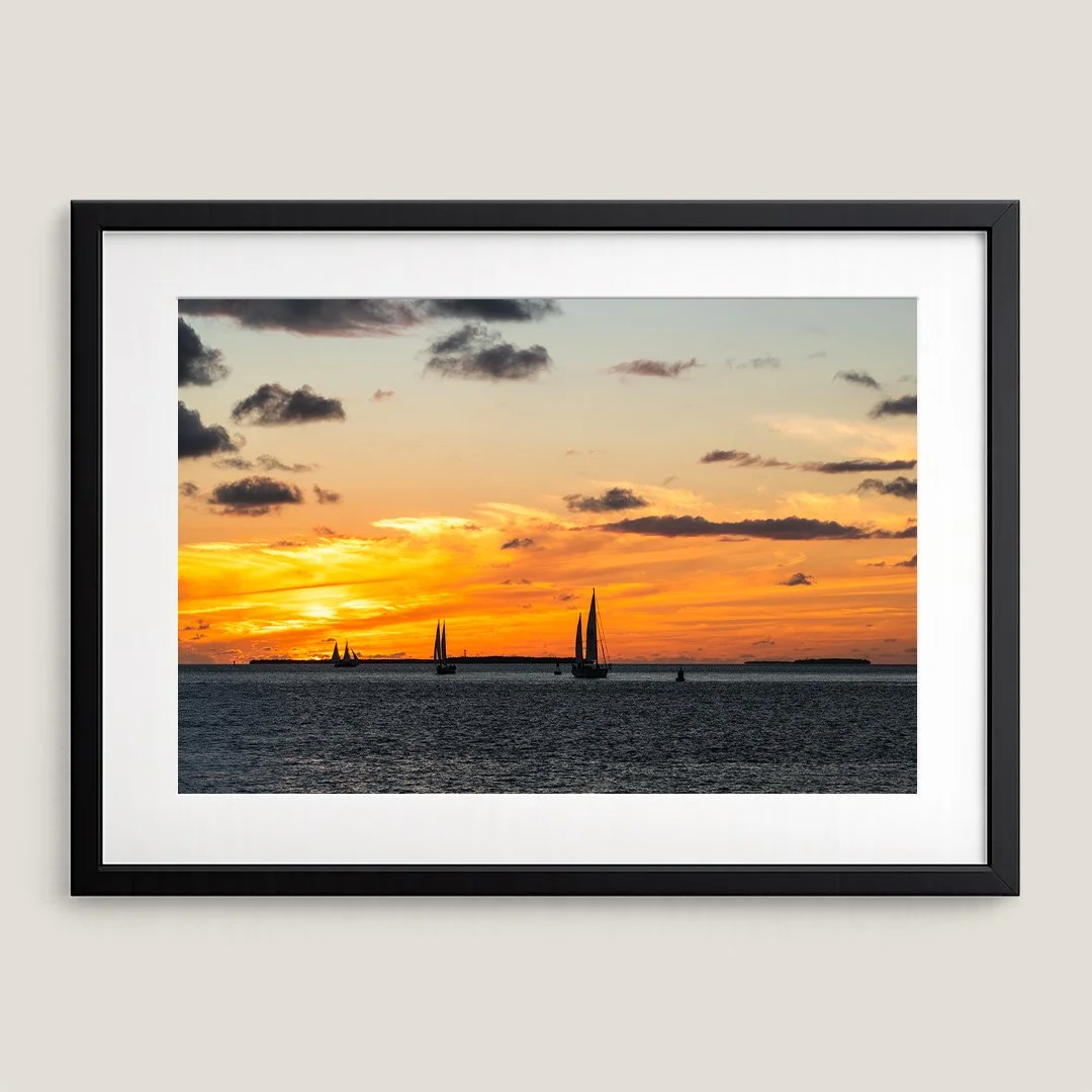 Florida Keys sailboat fine art print displayed in black wood frame.