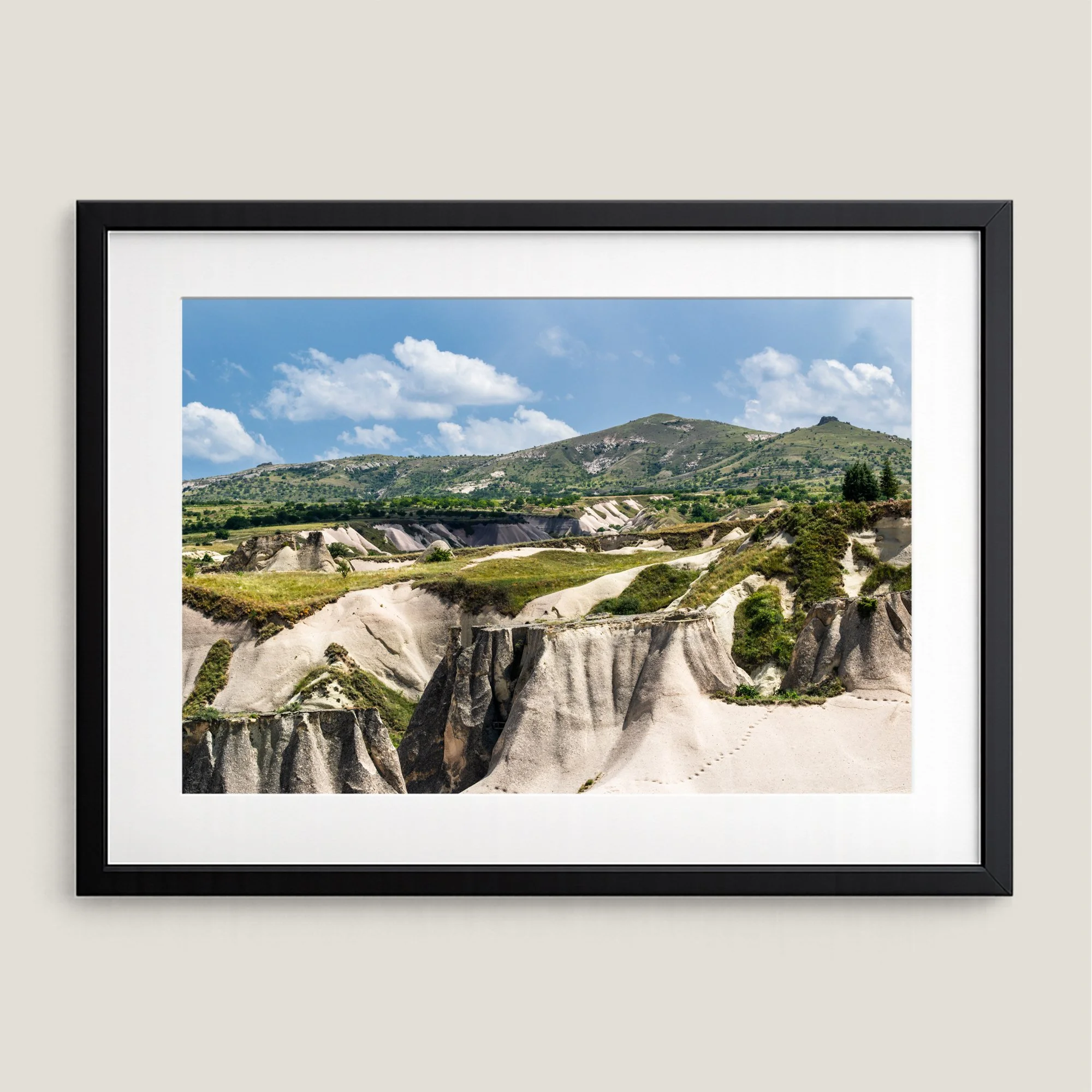 Framed landscape wall art of Goreme Valley in Cappadocia Turkey with blue sky