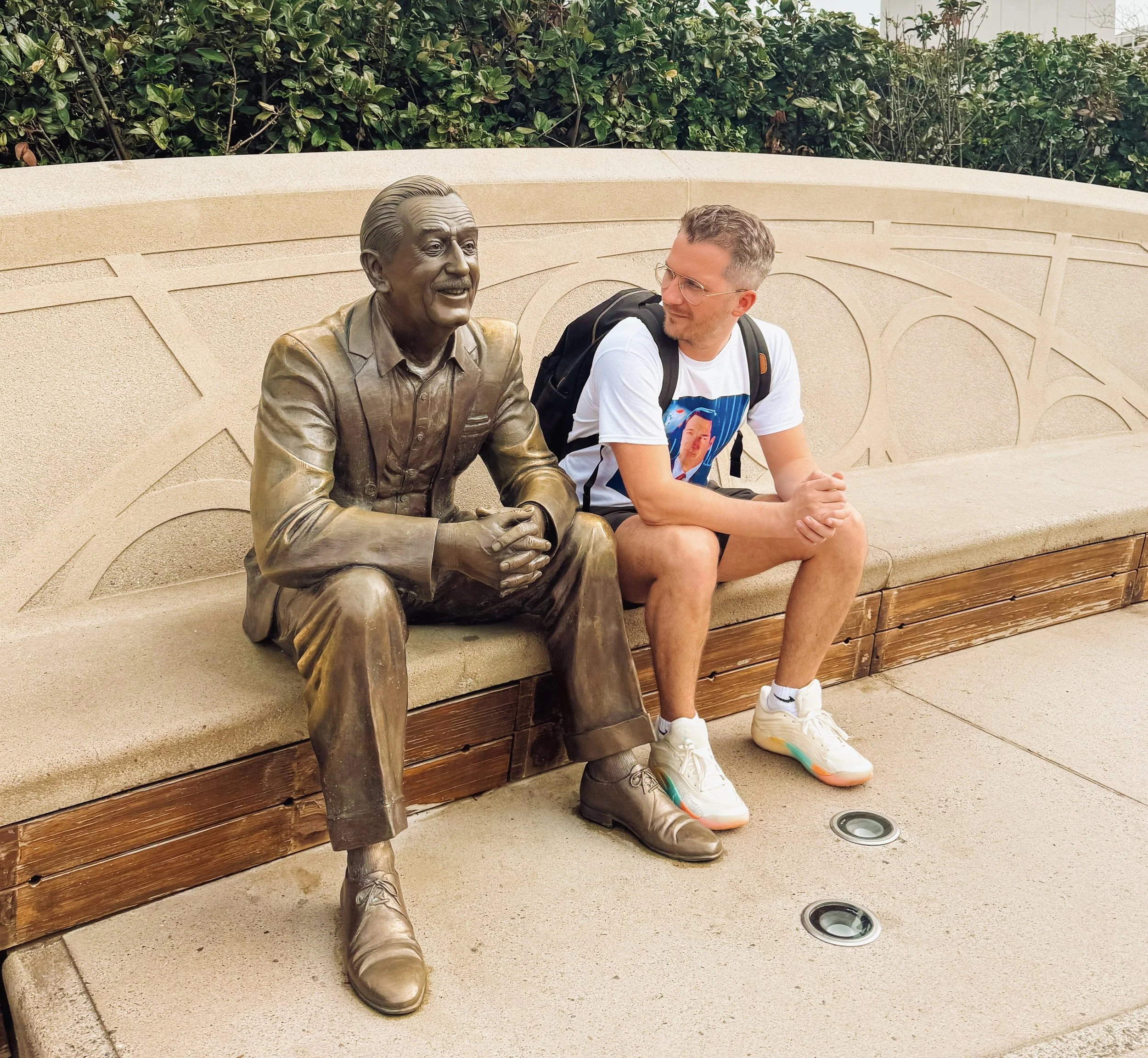 Hannah Marsh & Alex at Epcot with Walt Disney statue