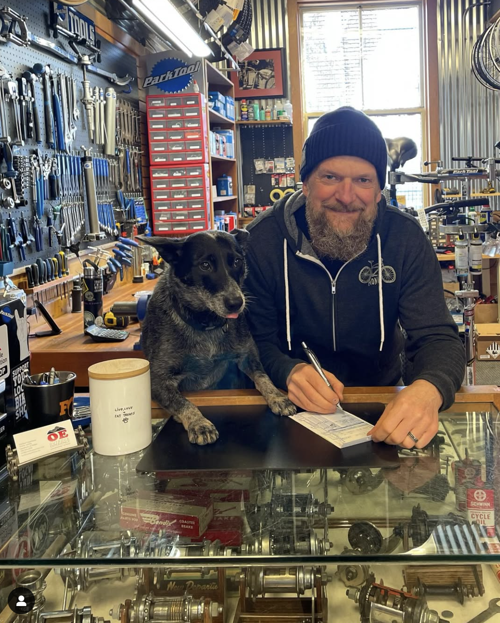 Brian (Greasy Fingers) and Shilo, ready to help fix your bike.